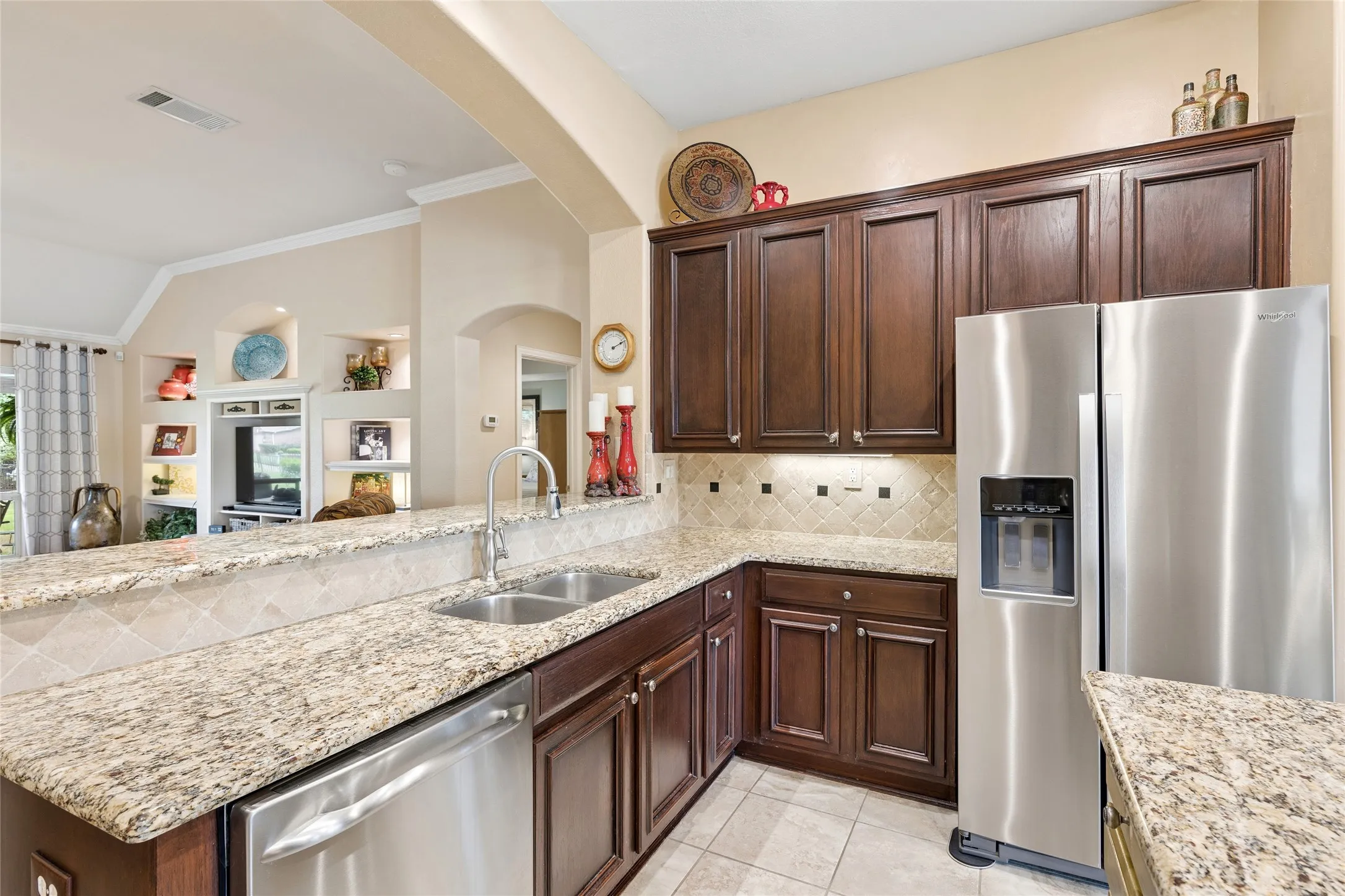 Bright kitchen with lots of counters and island for meal prep