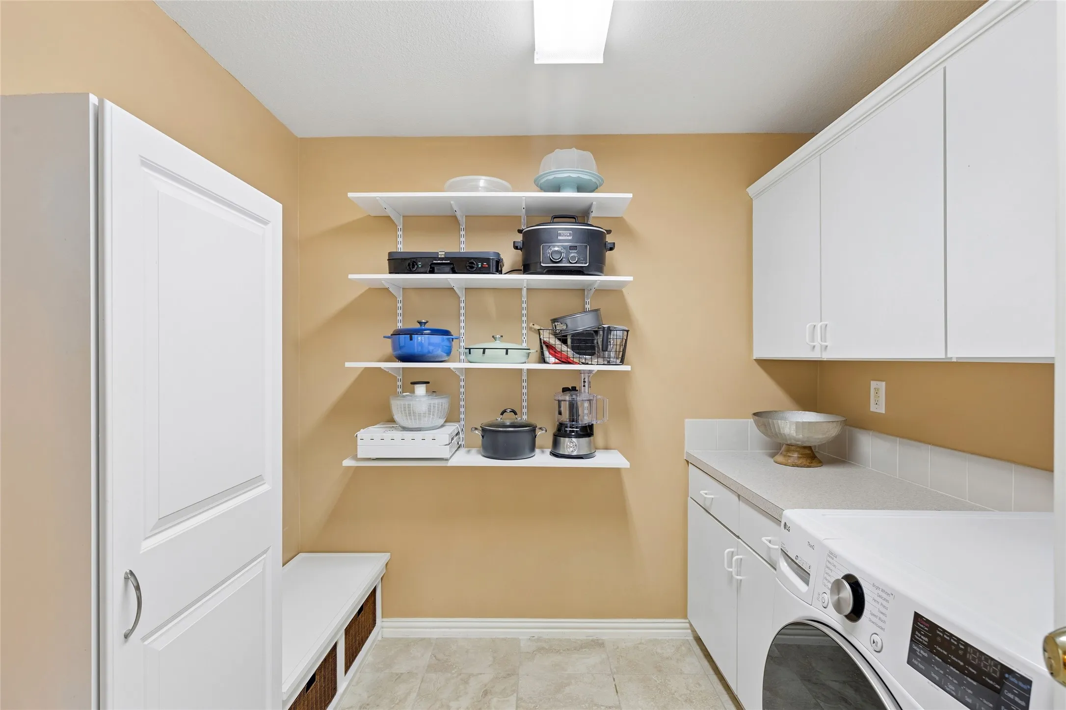 Roomy laundry room could a second refrigerator