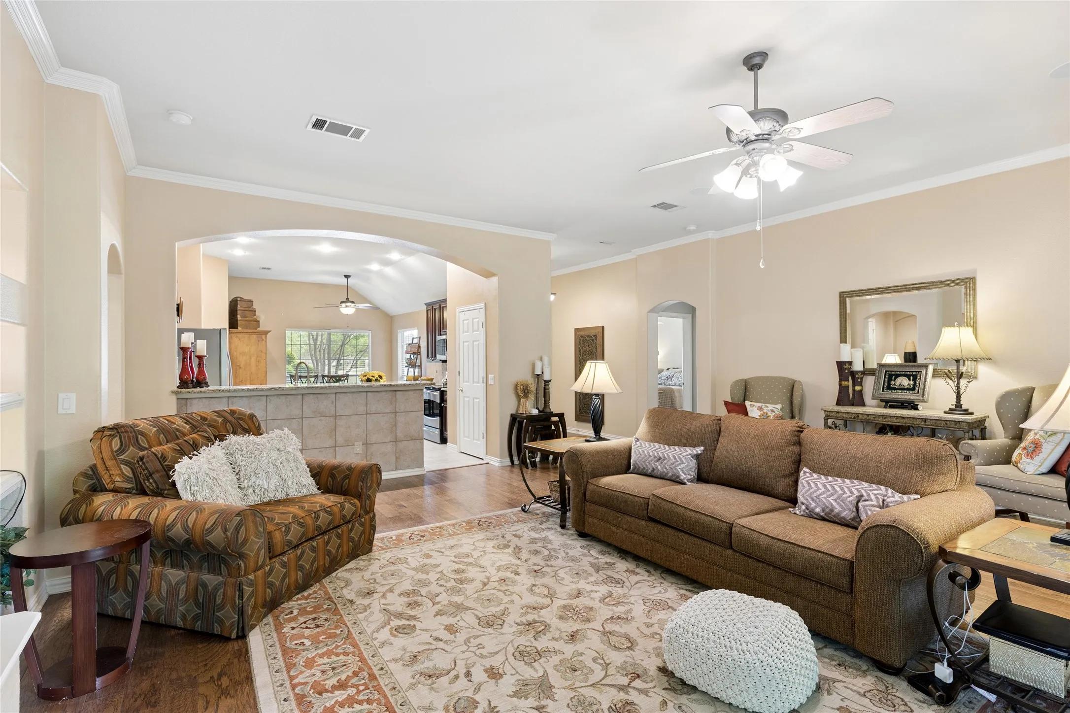 Living area open to kitchen with breakfast bar