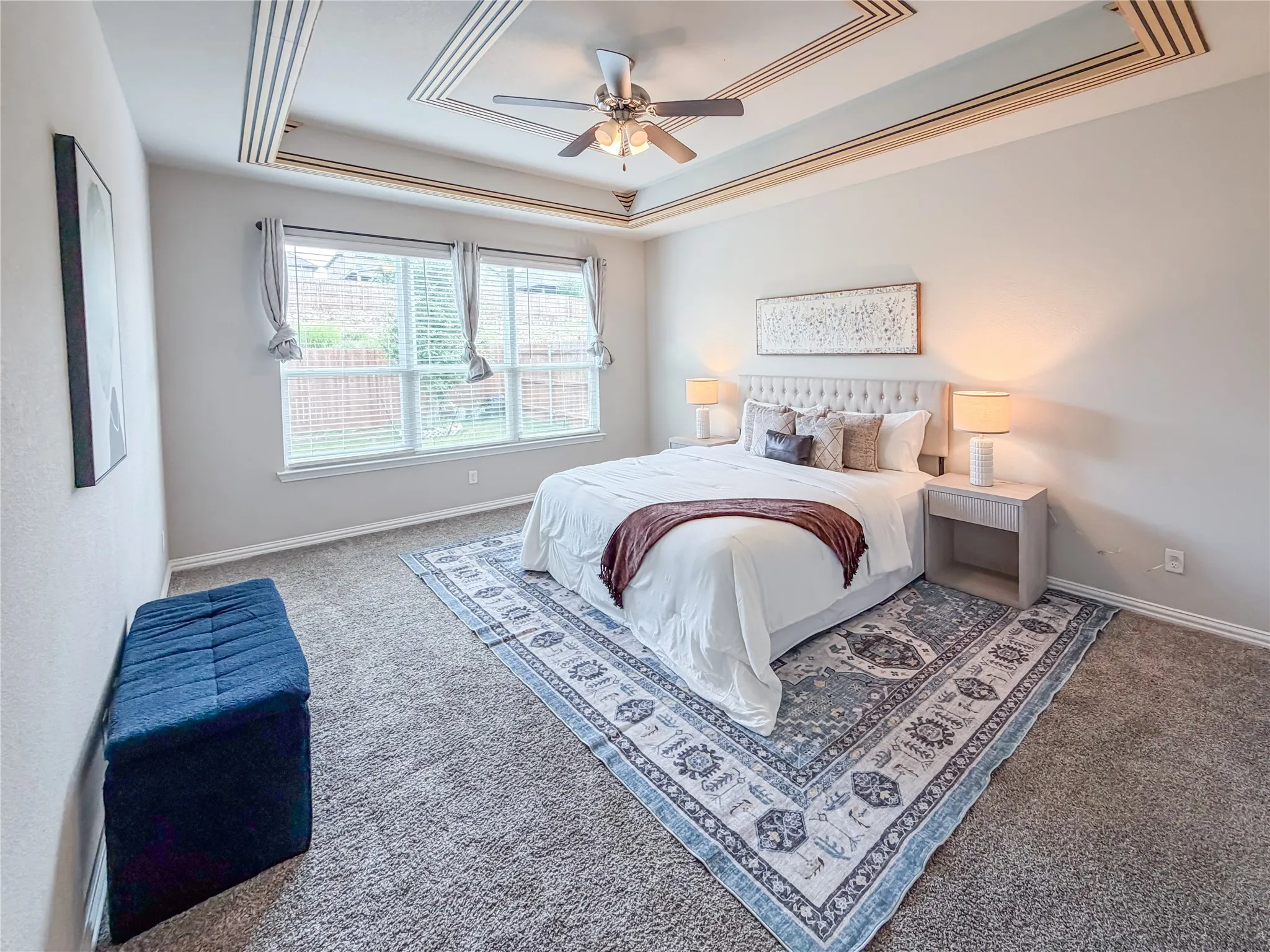 Tray ceiling with decorative trim and recessed lighting