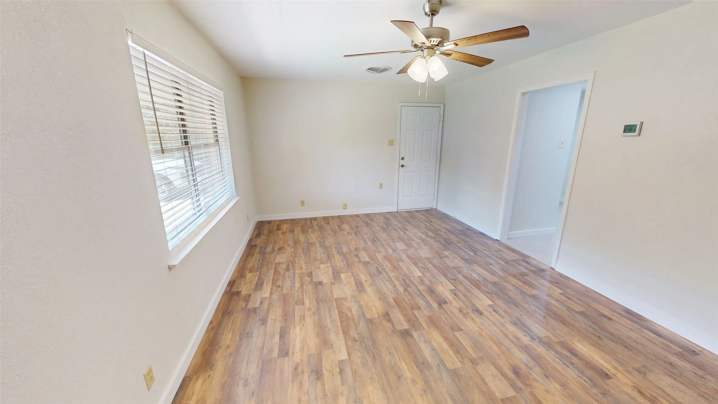 Unit 2415 Living room with direct access to garage