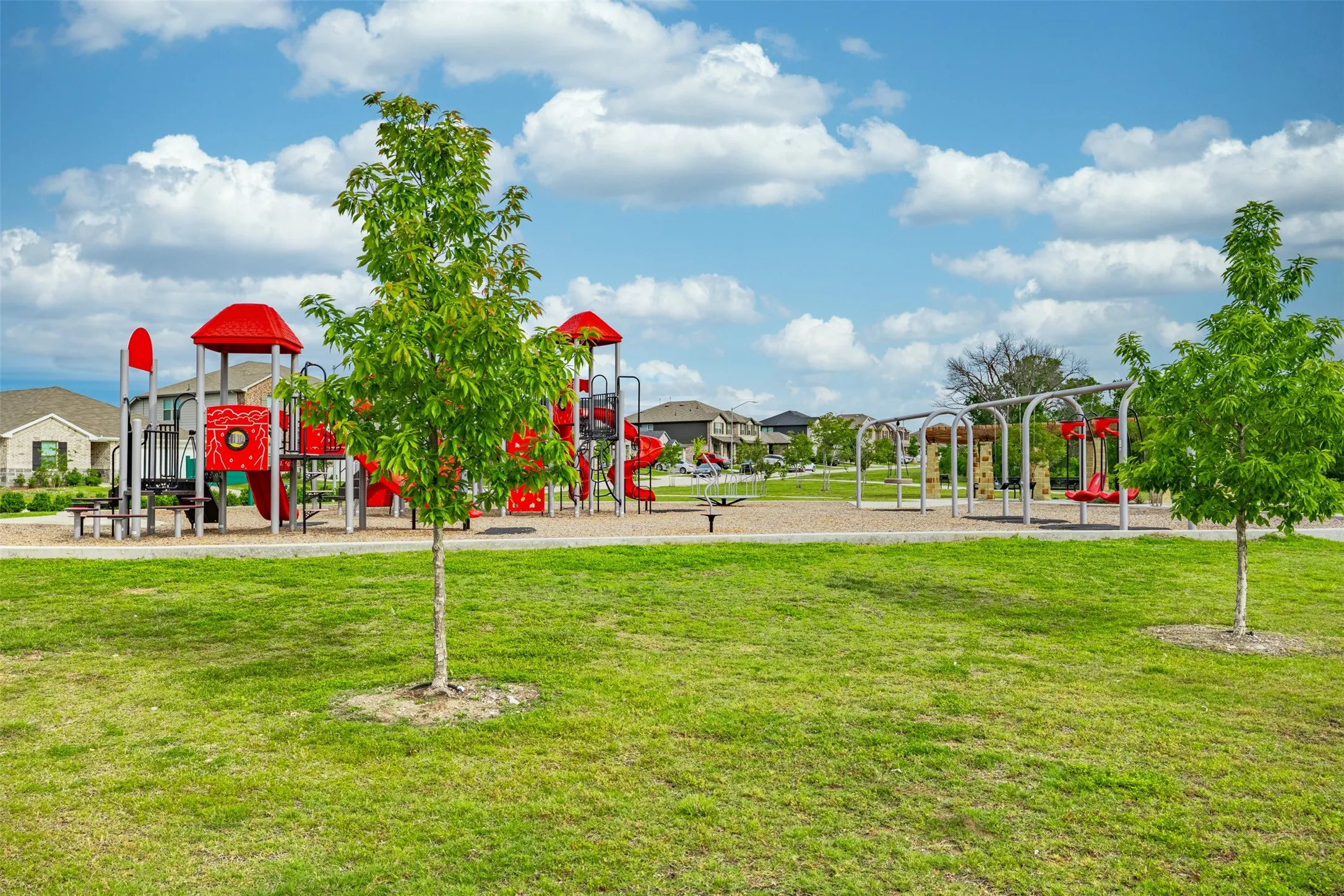 Neighborhood park directly across the street, offering green space, play areas, and easy access to outdoor activities.