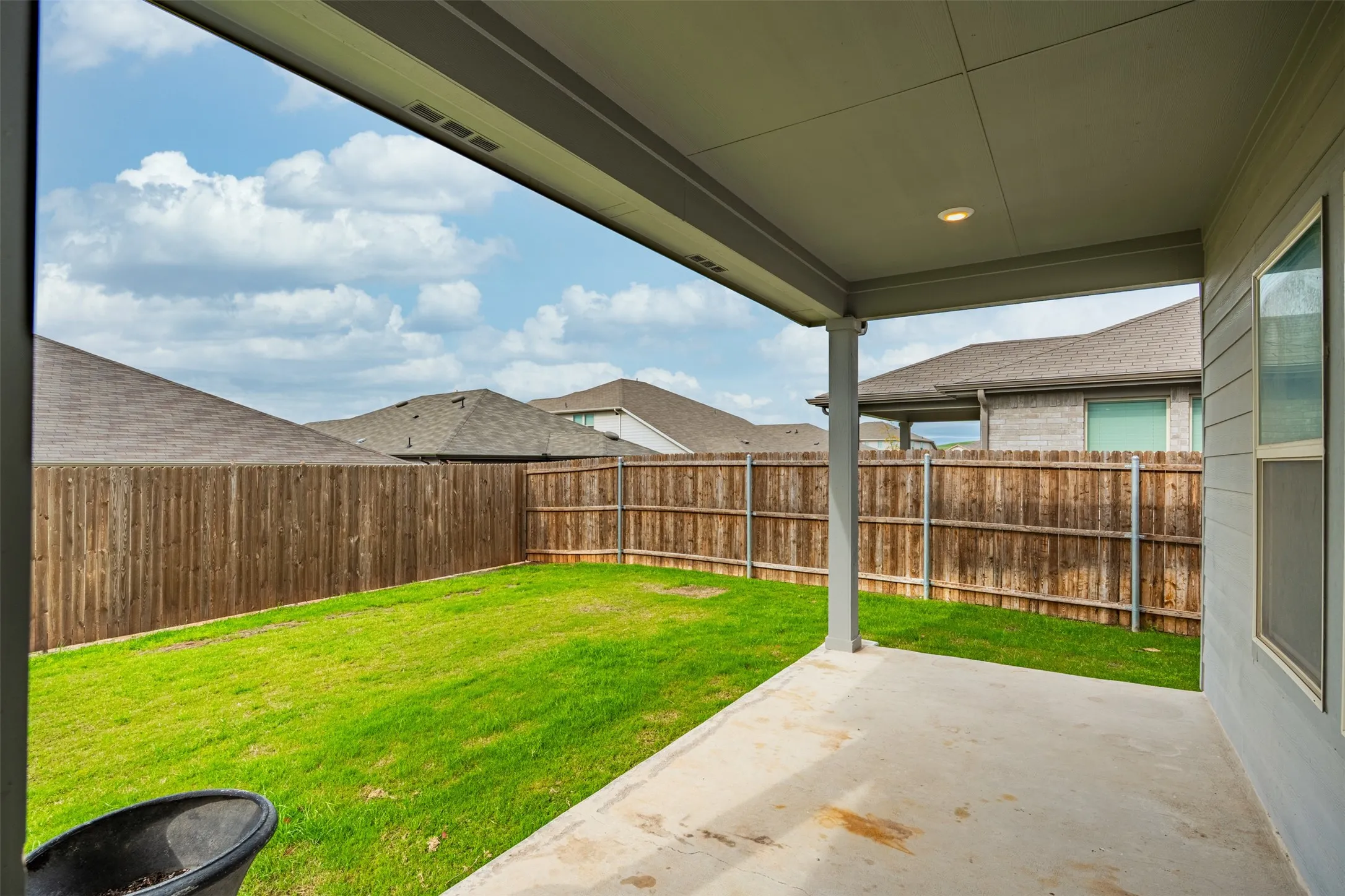 Private backyard space ready for outdoor enjoyment, entertaining, or relaxation.