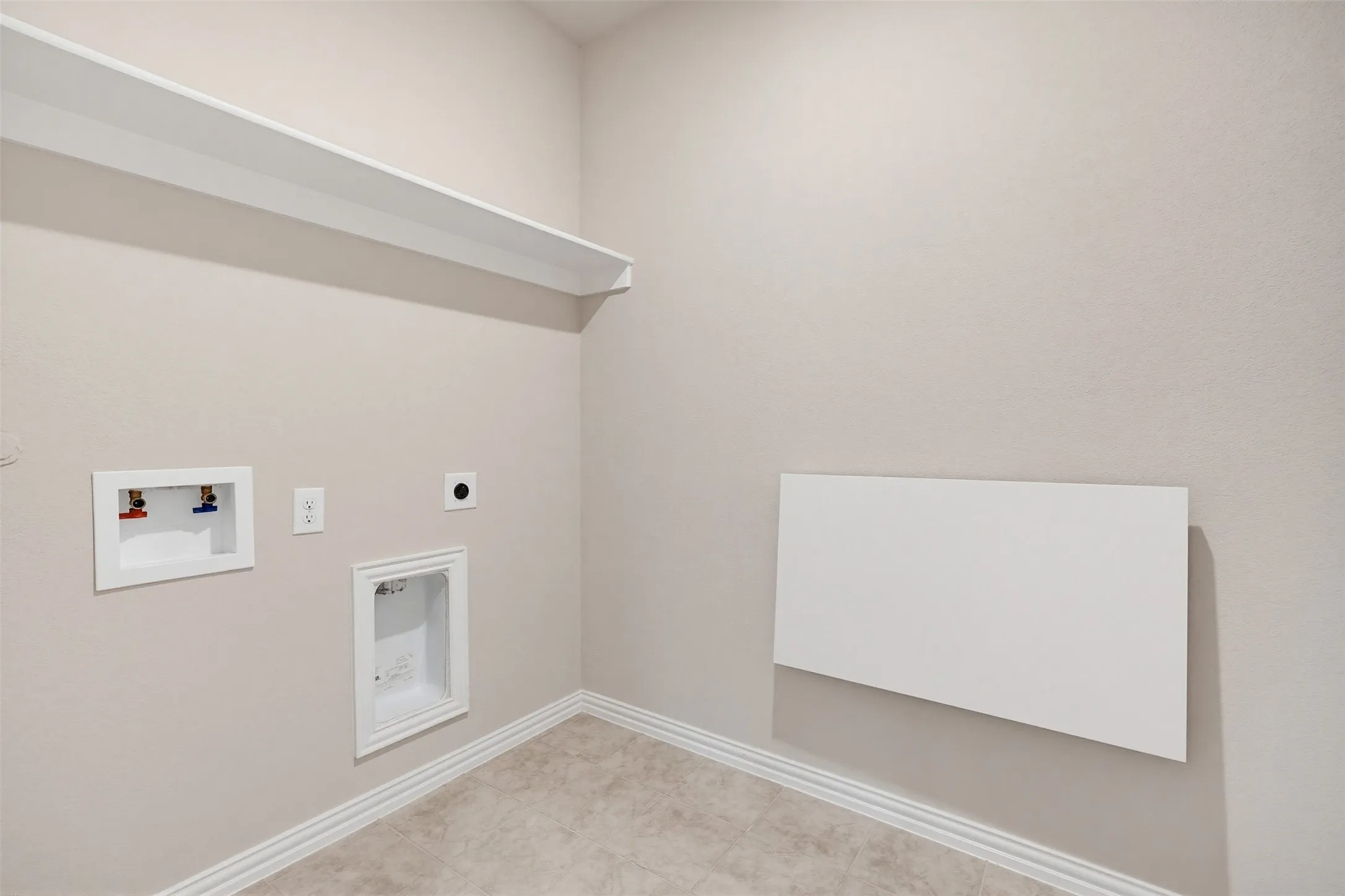 Dedicated laundry space designed for convenience and efficiency.