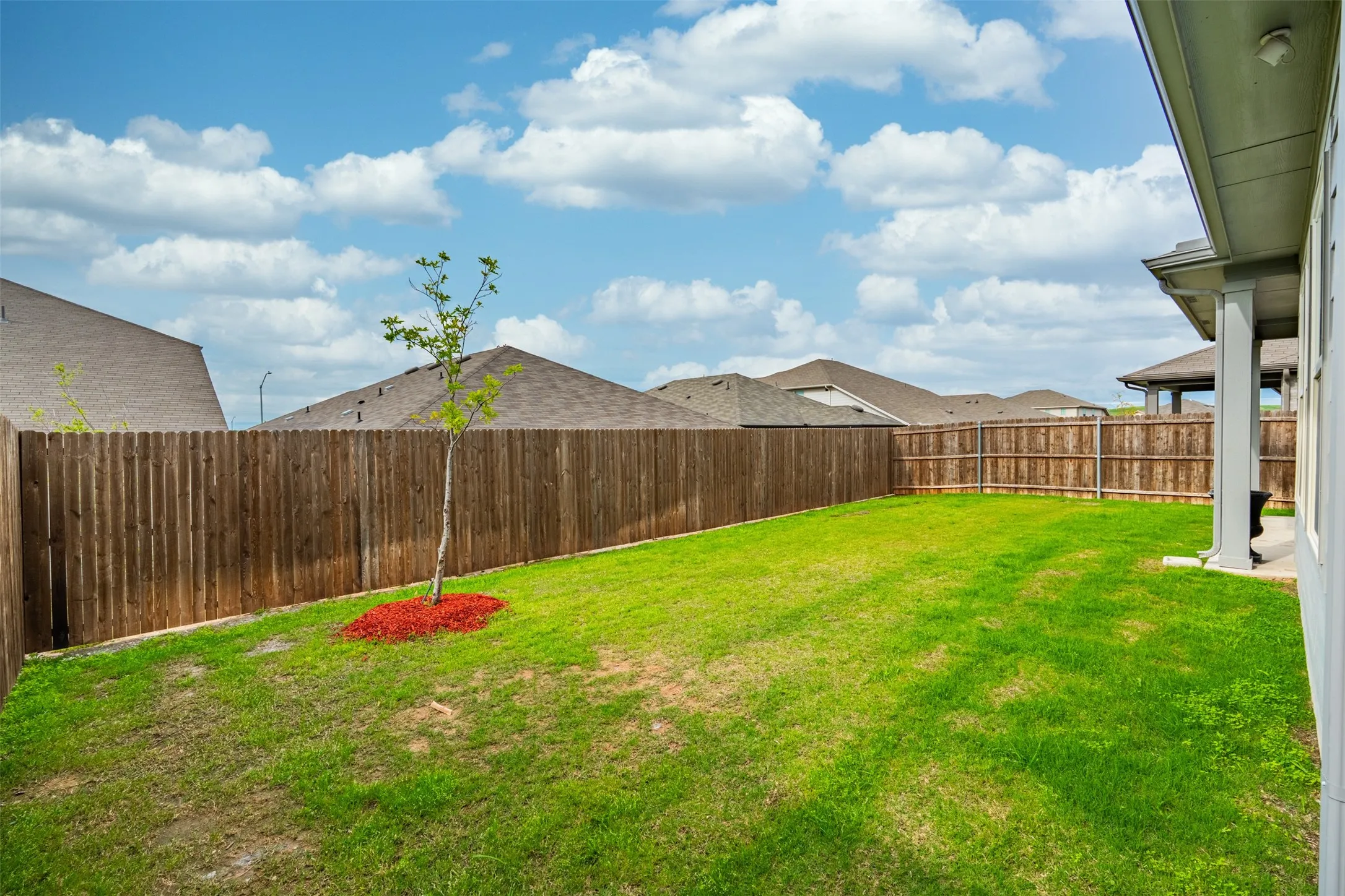 Private backyard space ready for outdoor enjoyment, entertaining, or relaxation.