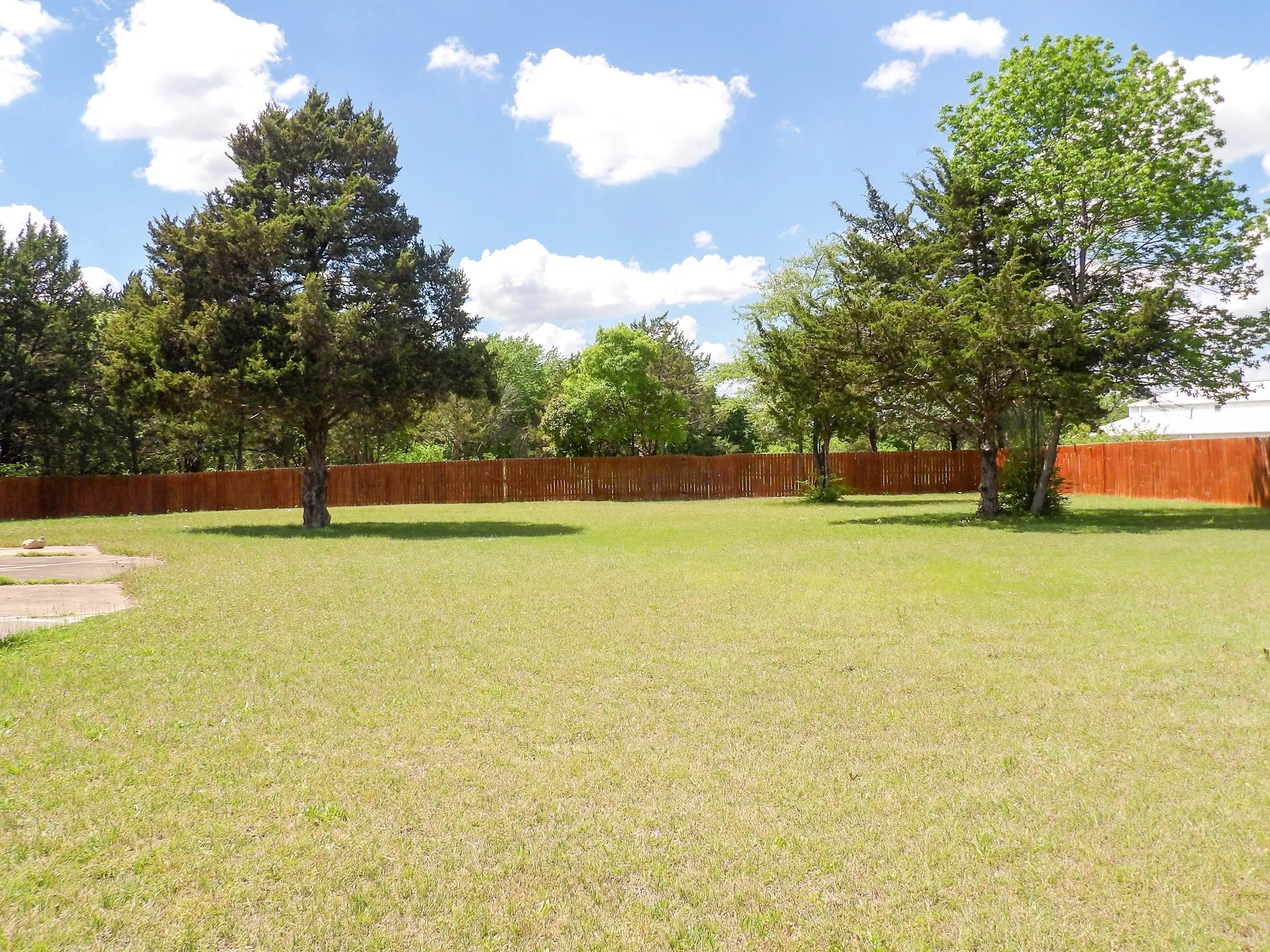 Rear view of 1 acre lot