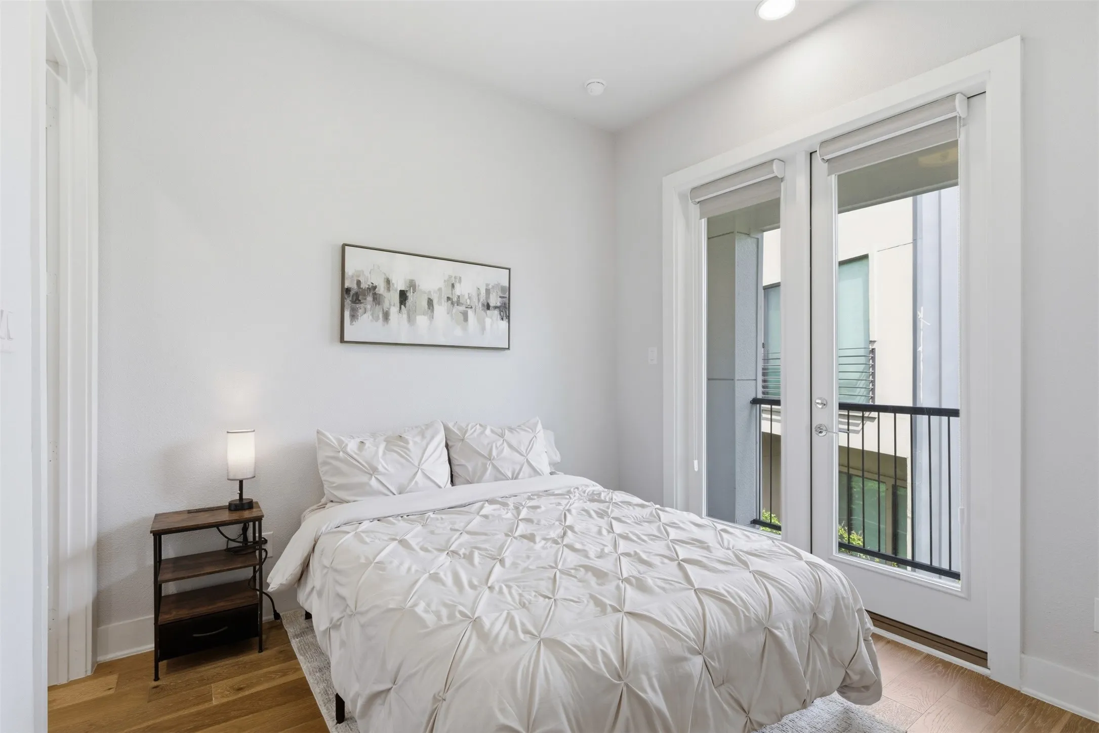 3rd floor: Guest bedroom has a view of Reunion tower.  Walk in closet and ensuite bathroom