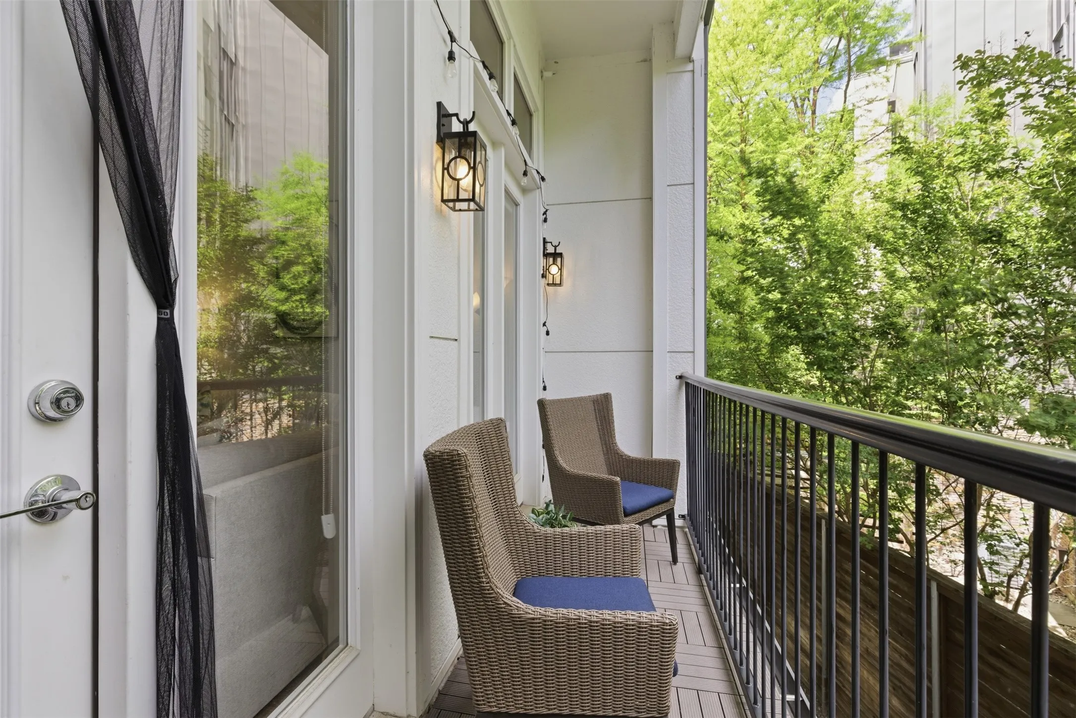 balcony floor plan with tree-lined canopy views