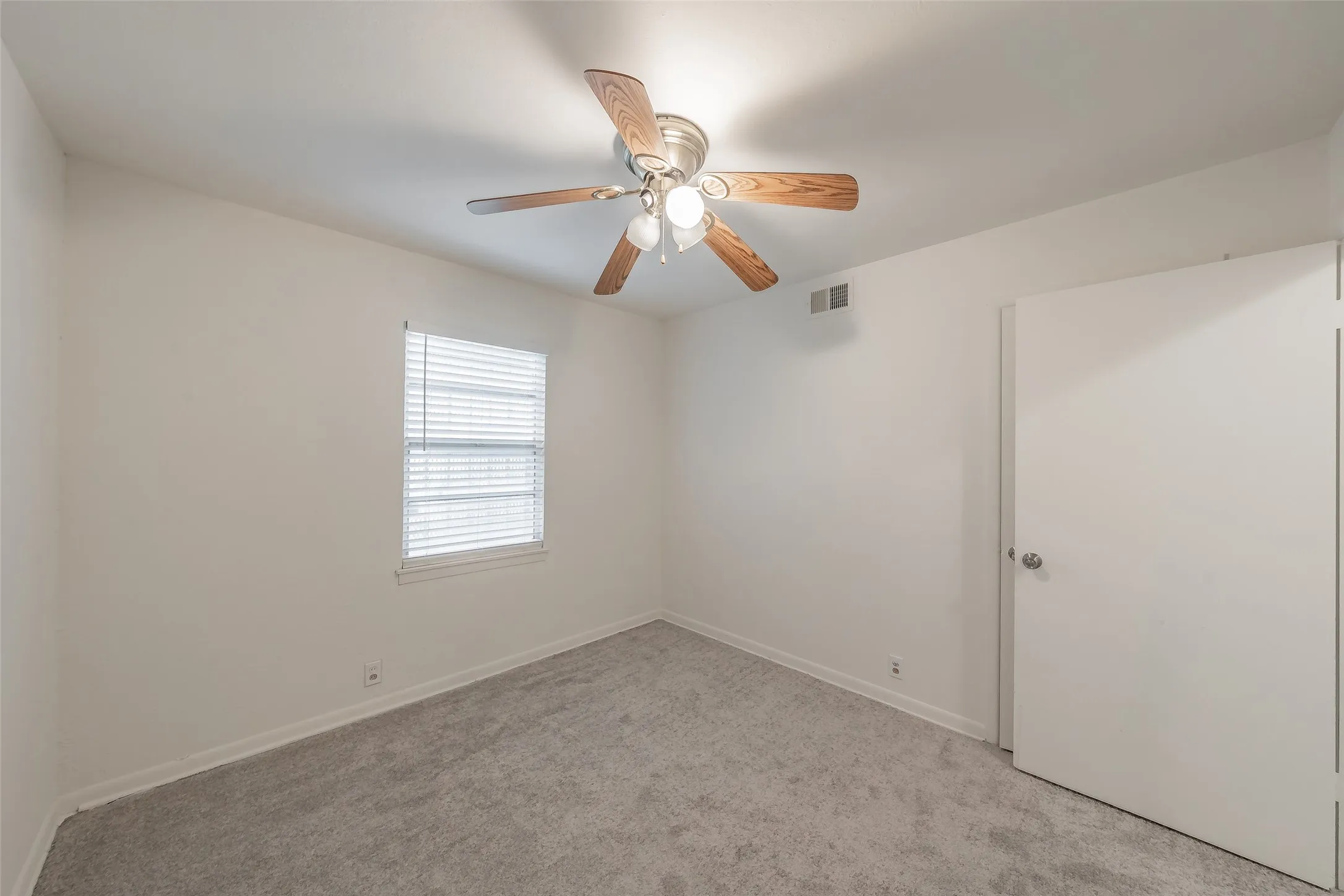Bedroom 2 Neutral wall finishes throughout