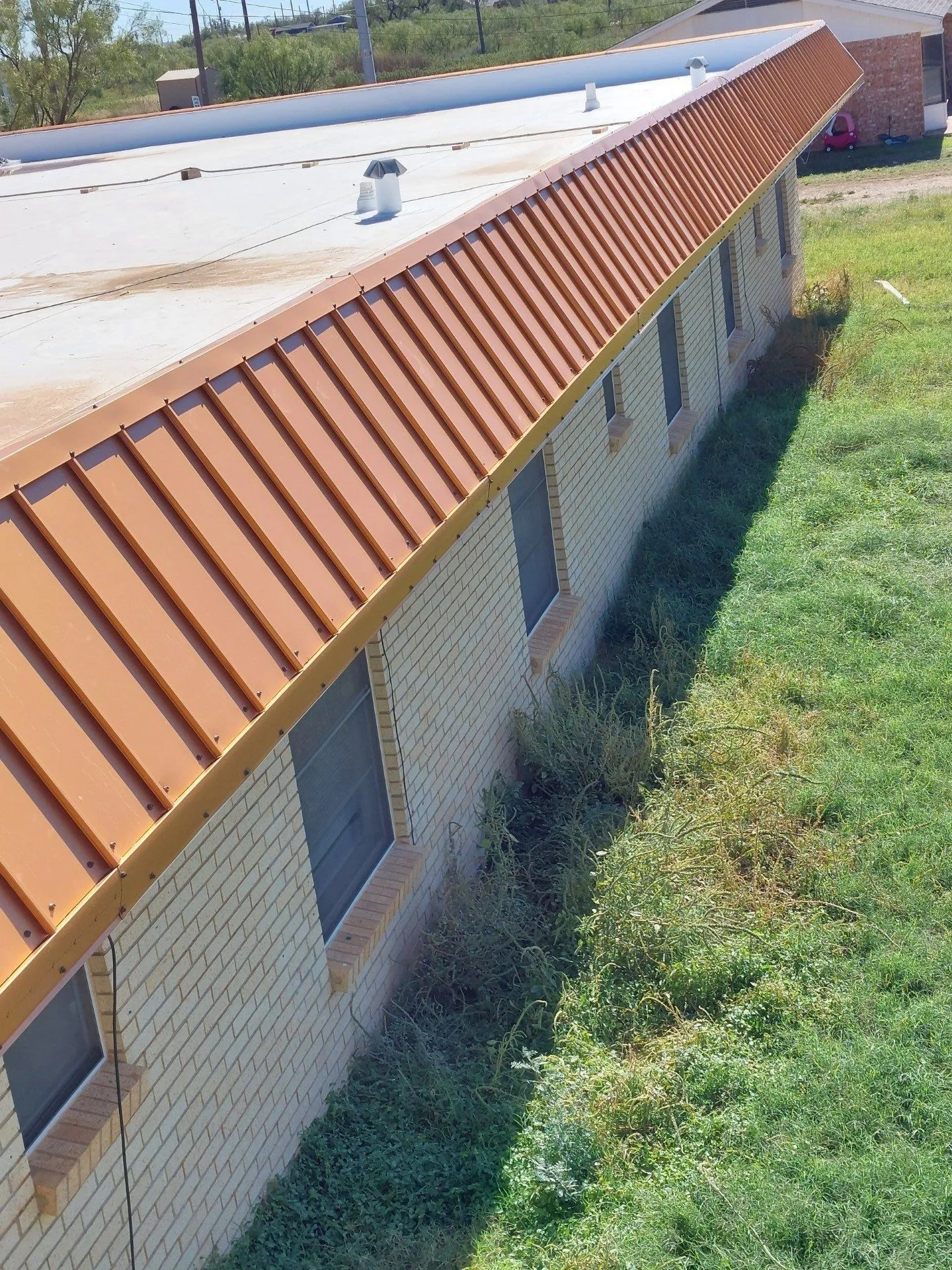 Copper painted Standing Seam roof mansard & metal perimeter trim