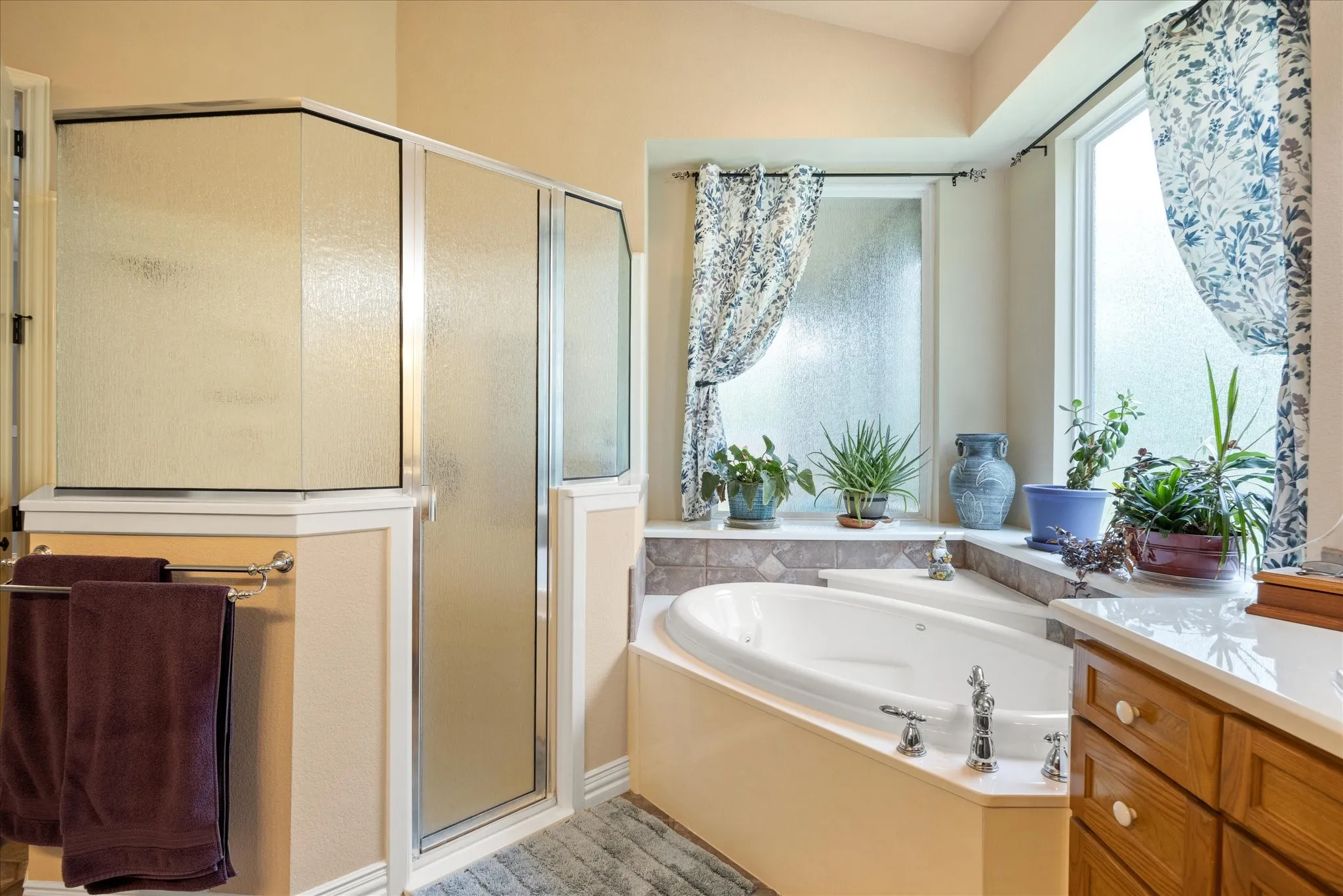 Primary bathroom has separate tub and shower.