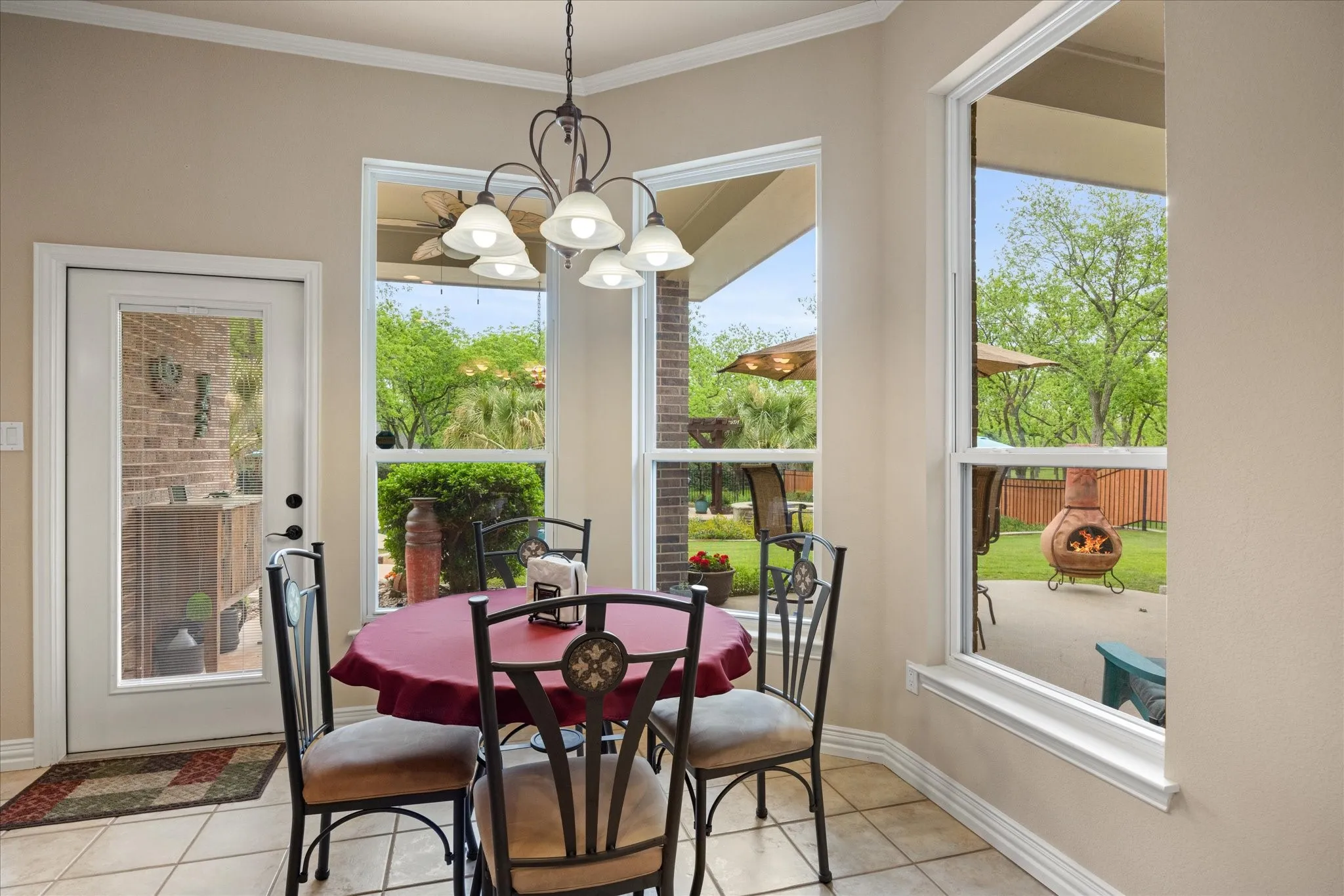 Dining area offers great views of the backyard.