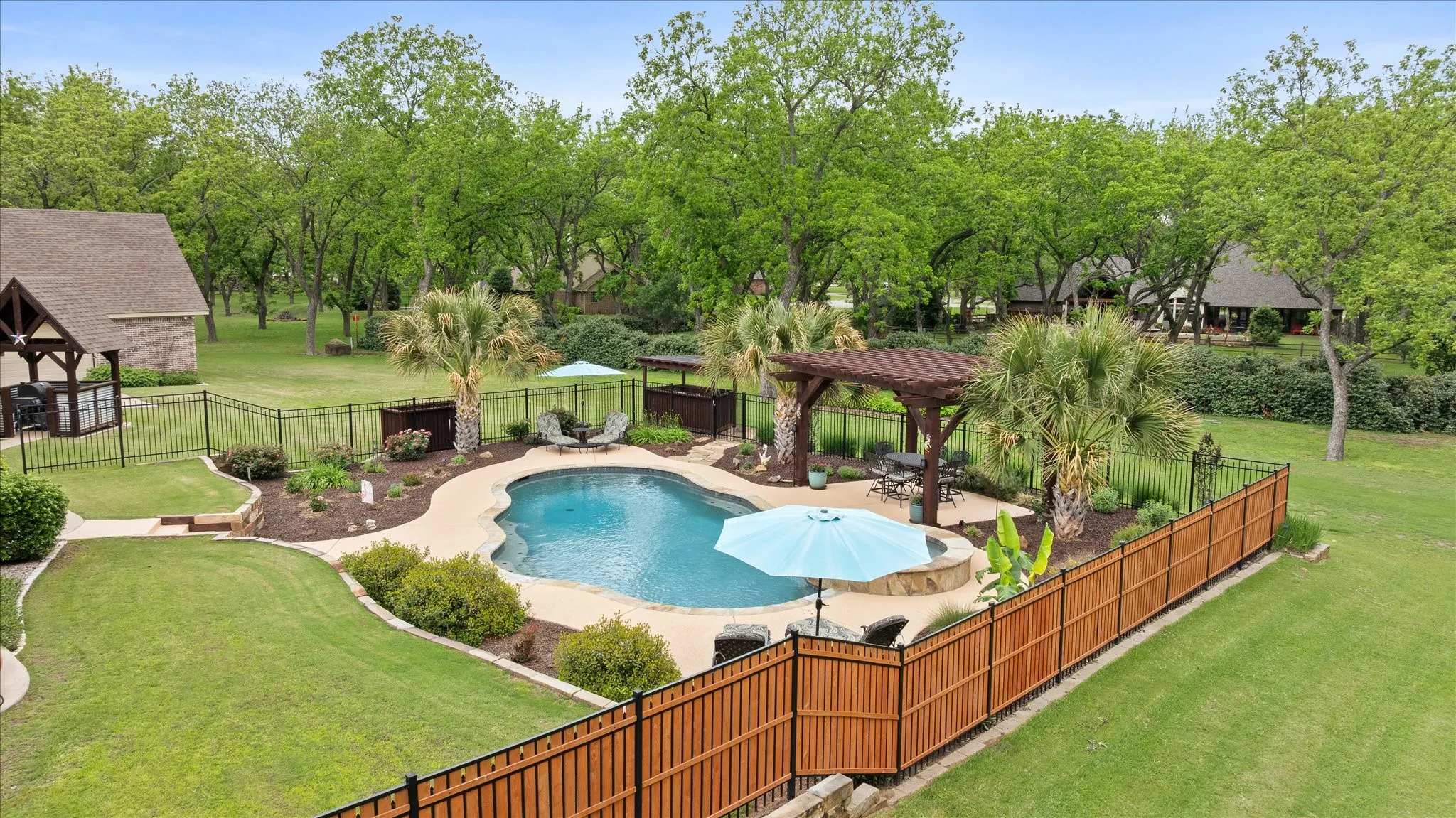 The backyard and pool area are private, a great place to entertain!