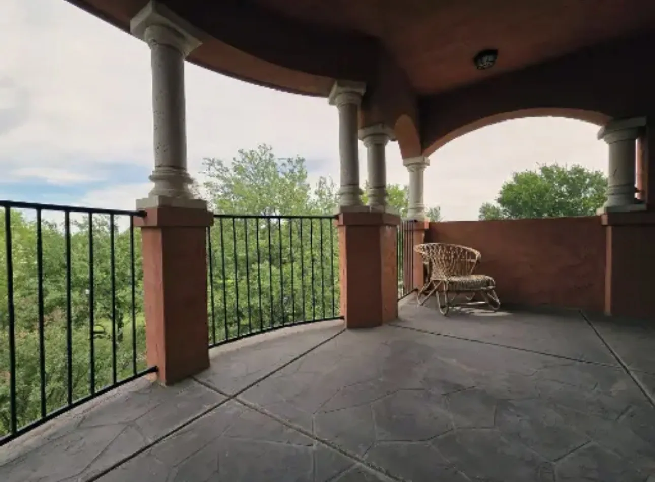 Oversized 3rd floor balcony with partial lake view