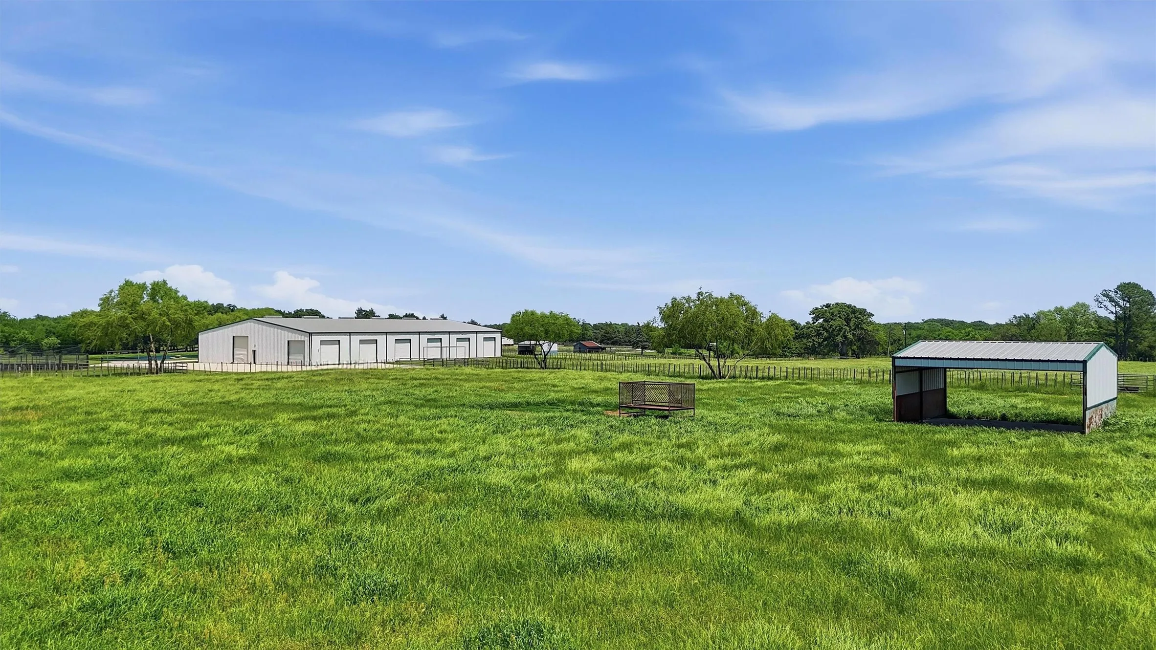 Rear of the Arena Barn-Breeding Lab has 6 roll-up doors
