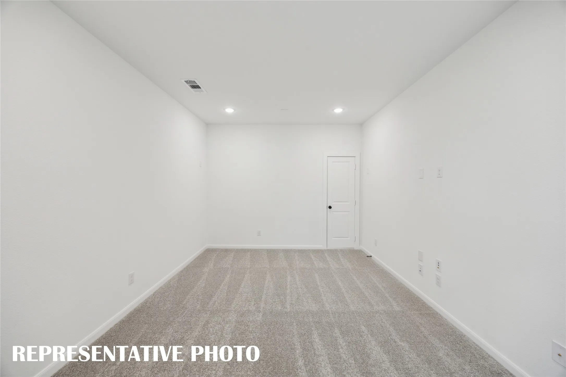 This spacious media room with adjacent gaem room creates the ultimate family entertainment area.