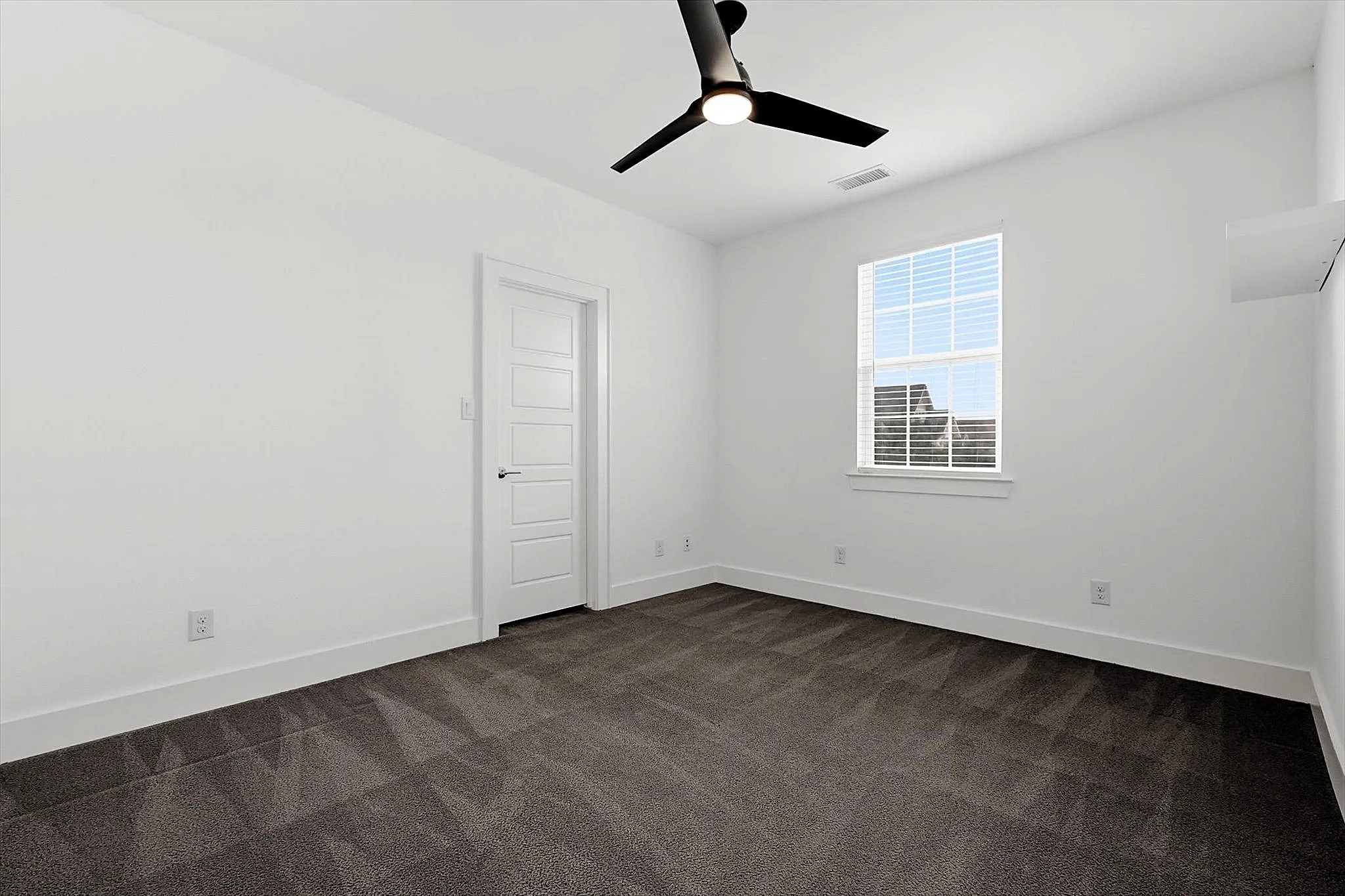 Ensuite bedroom on second floor separated by stairwell landing for privacy