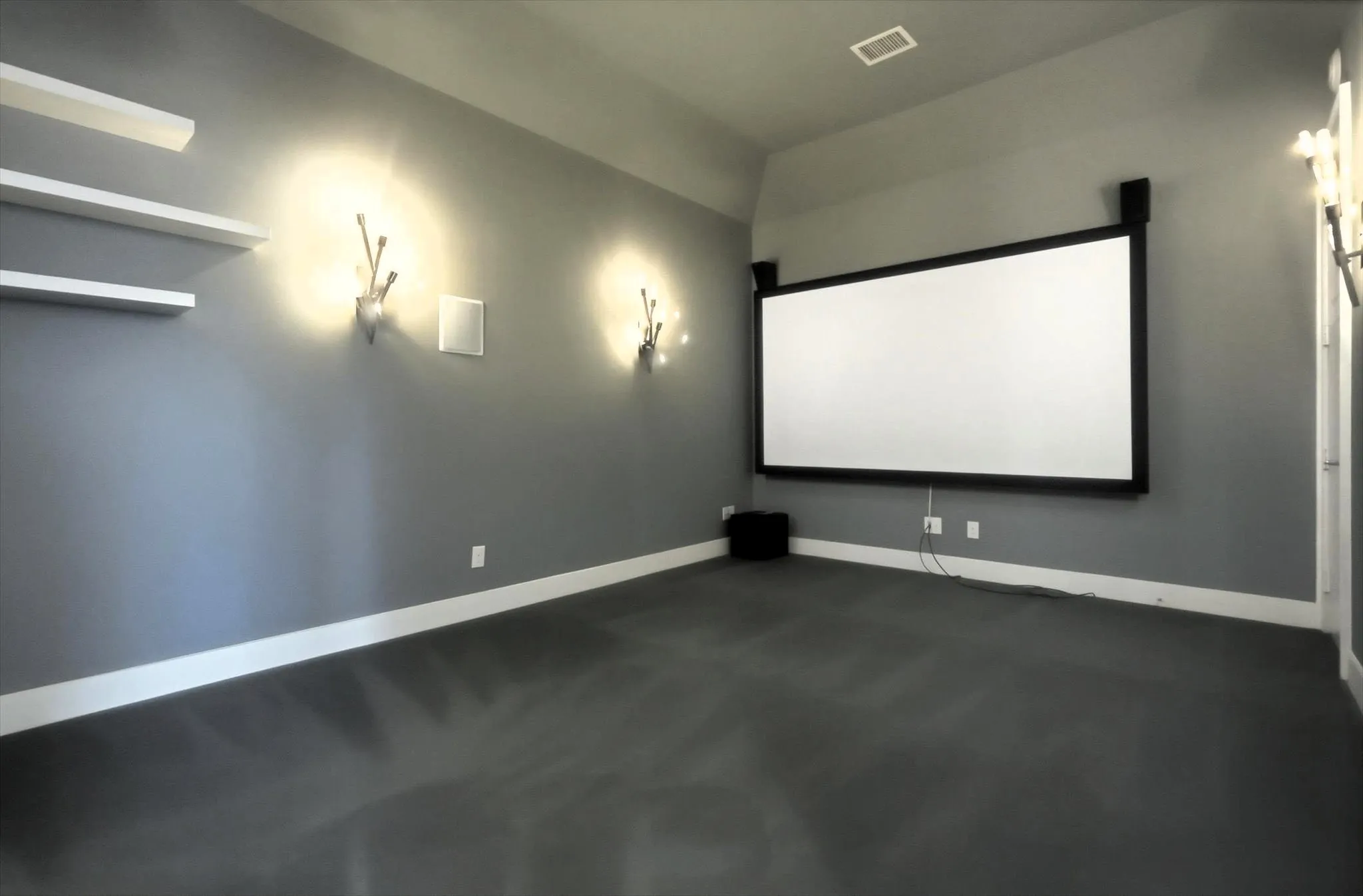 The media room includes seven built in speakers for movie nights