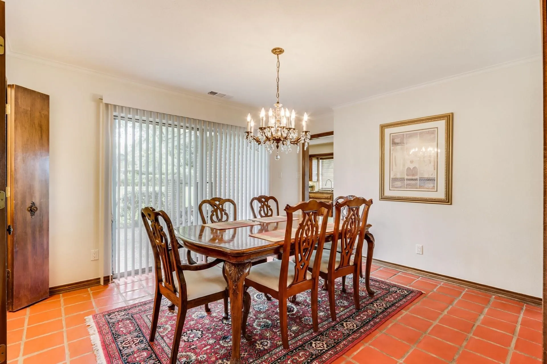 Terracotta tile flooring throughout this dining space