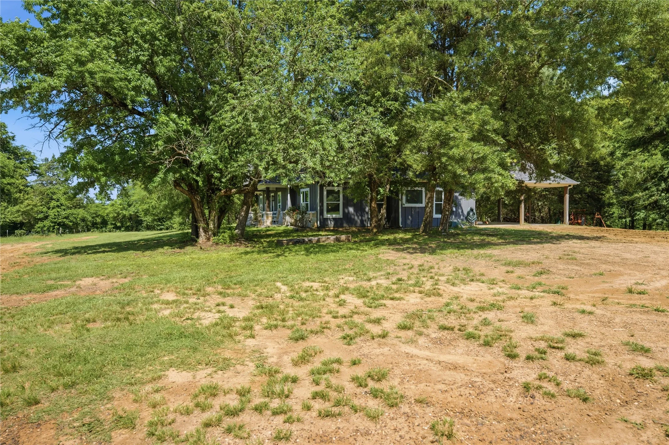 Side view with carport area
