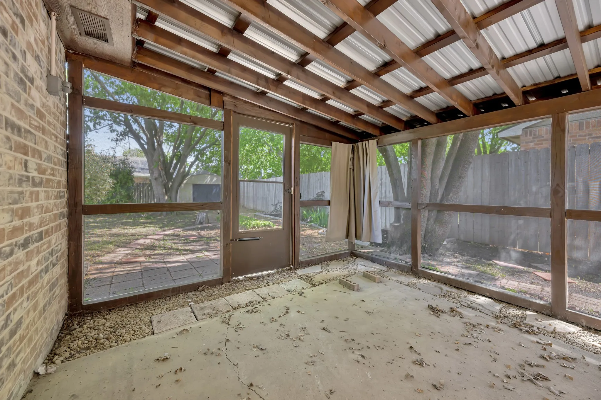 Enclosed porch/ sunroom.