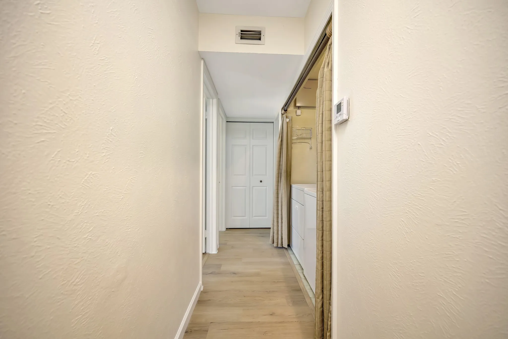Hallways to secondary bedrooms.