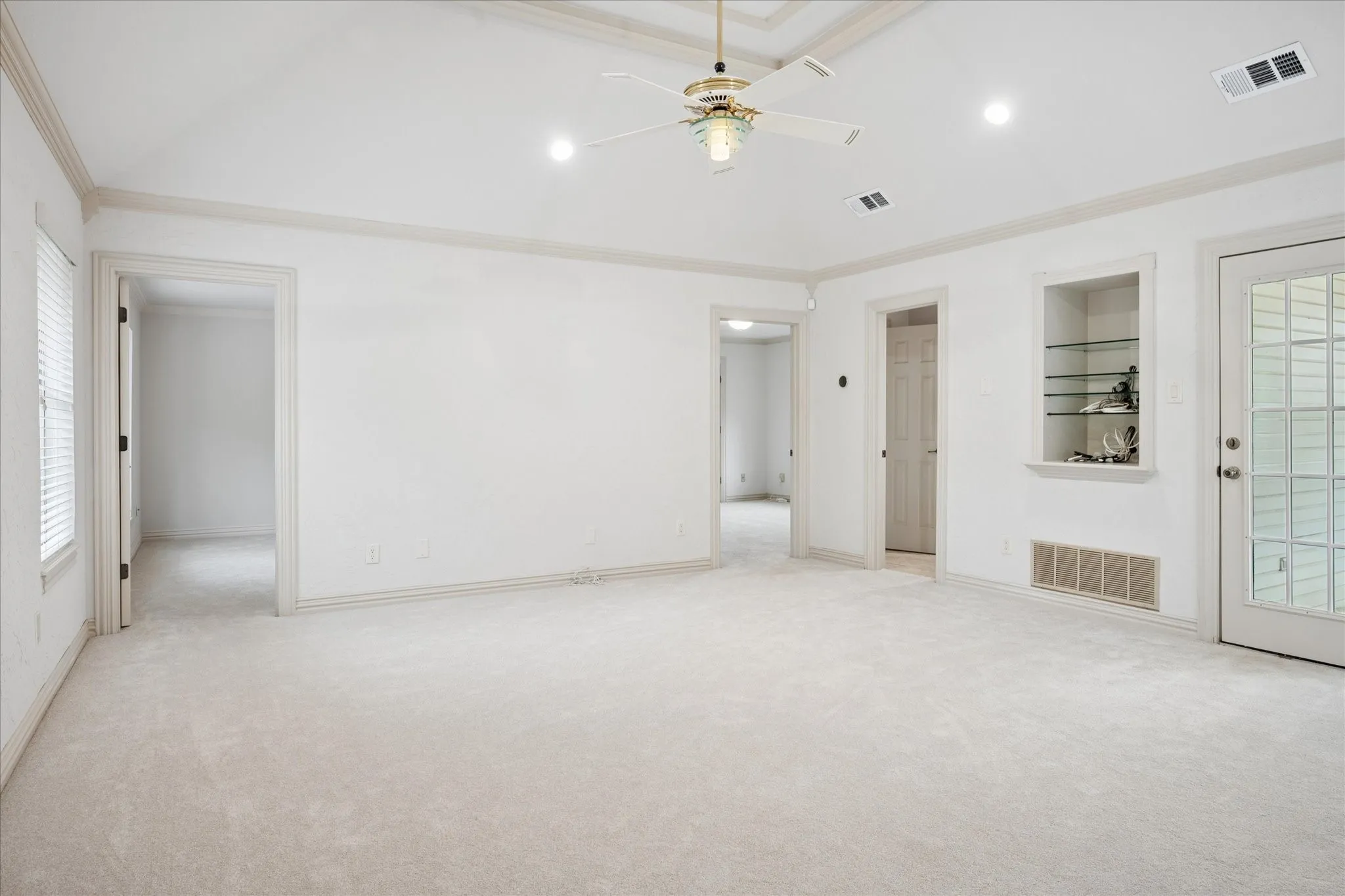 Flex space has doors that lead to a balcony