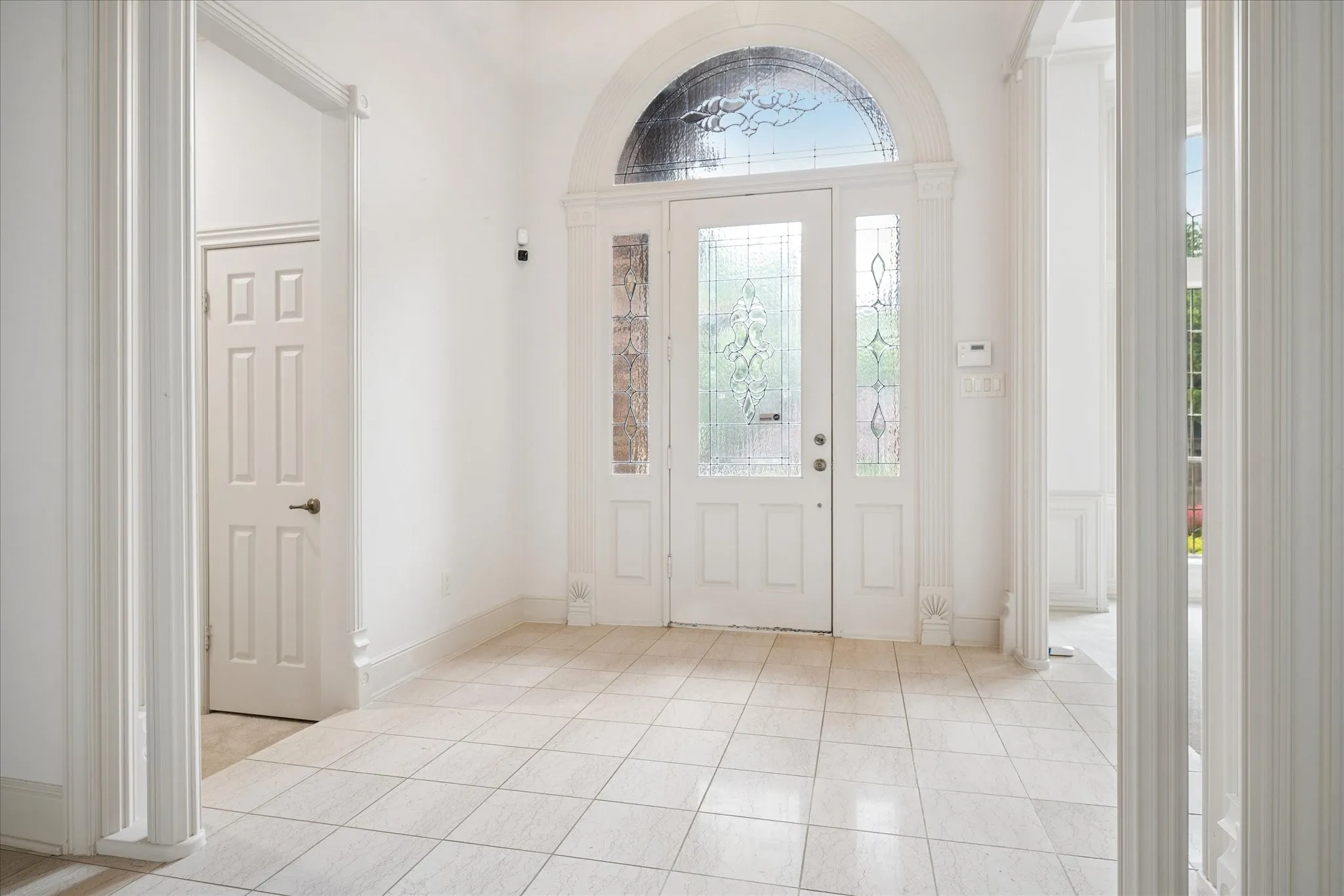 Grand Entryway with High Ceilings