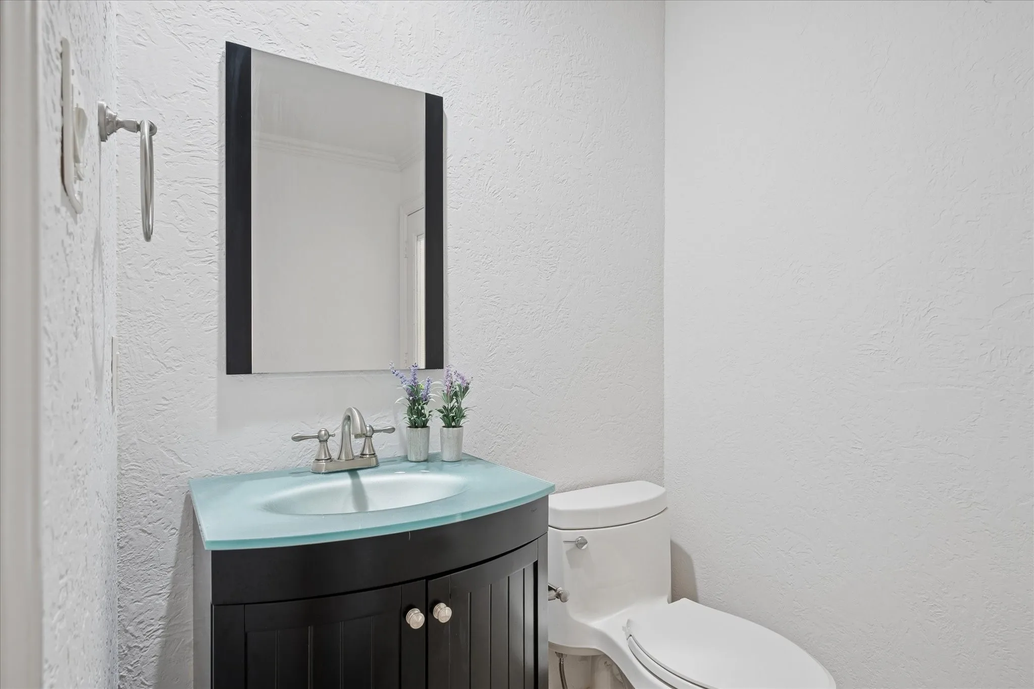 Half Bath and access to back patio and pool area