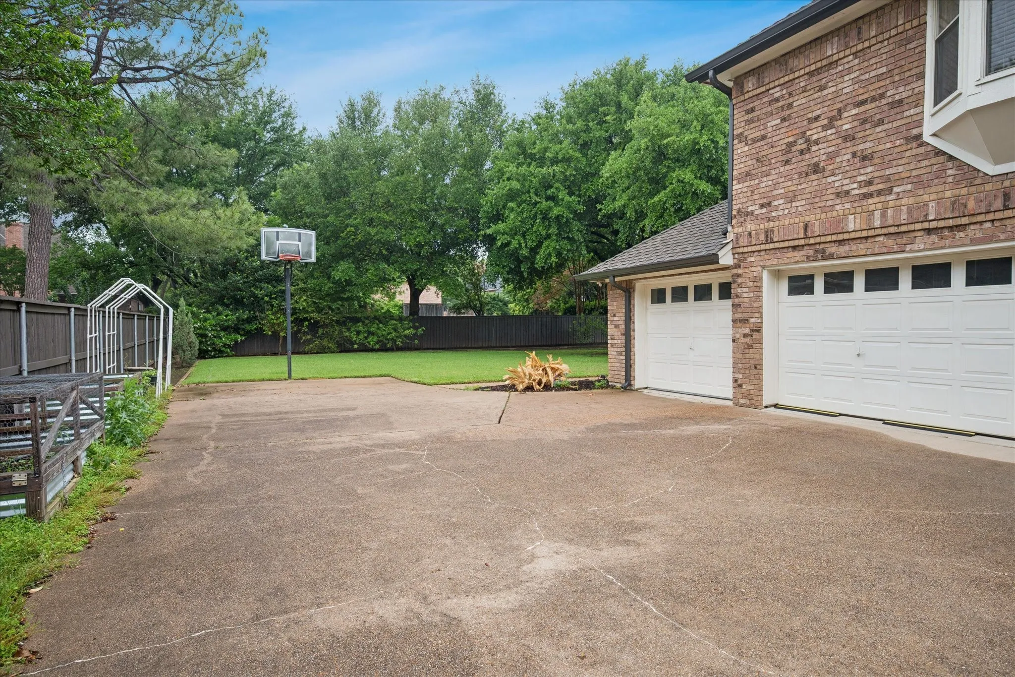 Three Car Attached Garage and plenty of driveway for extra parking