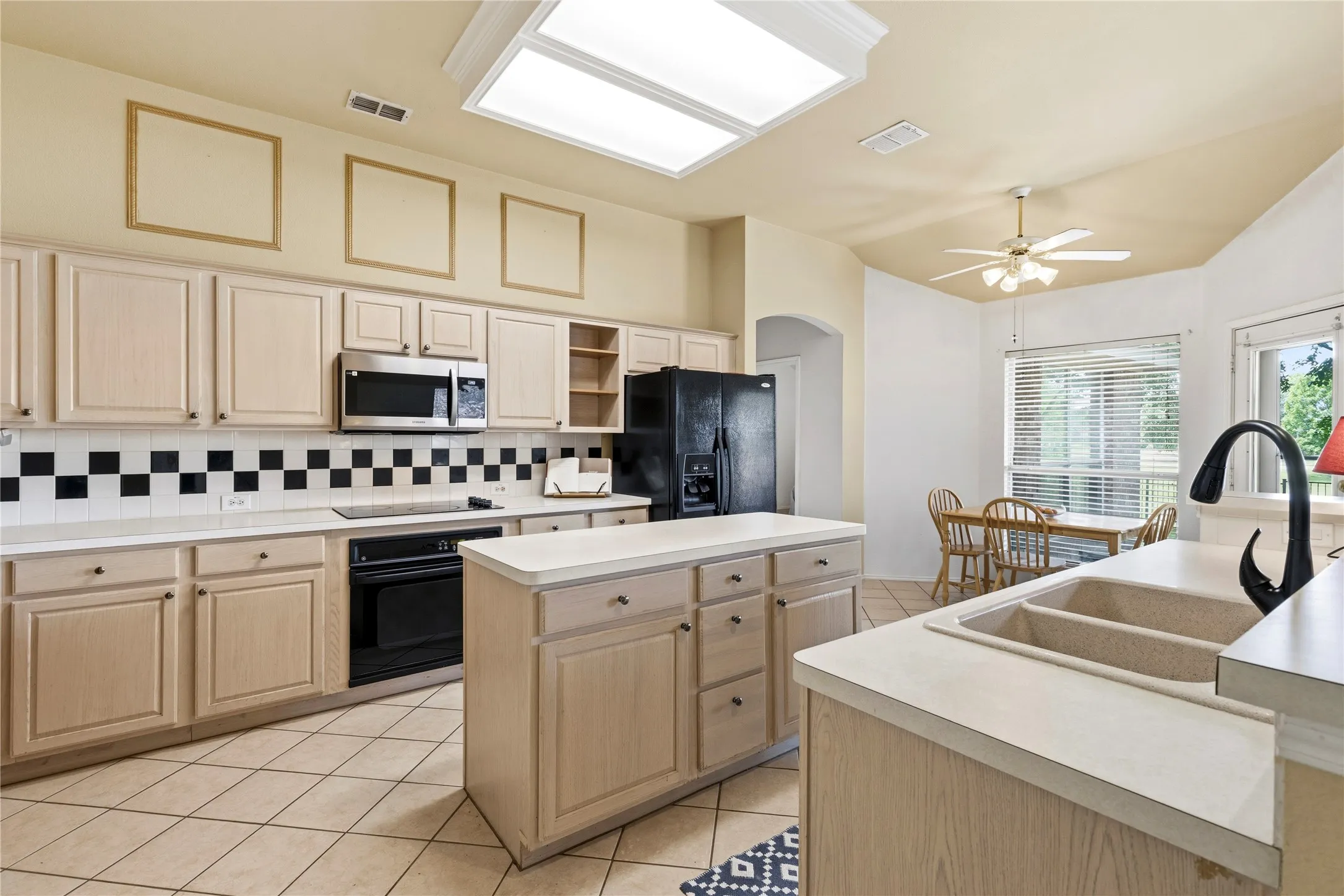 Spacious kitchen with ample counter space.