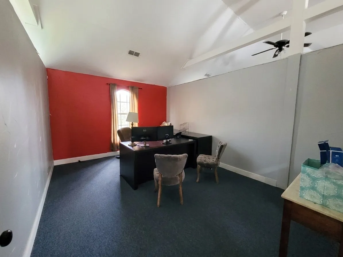 Each office space is large enough for more than one desk.