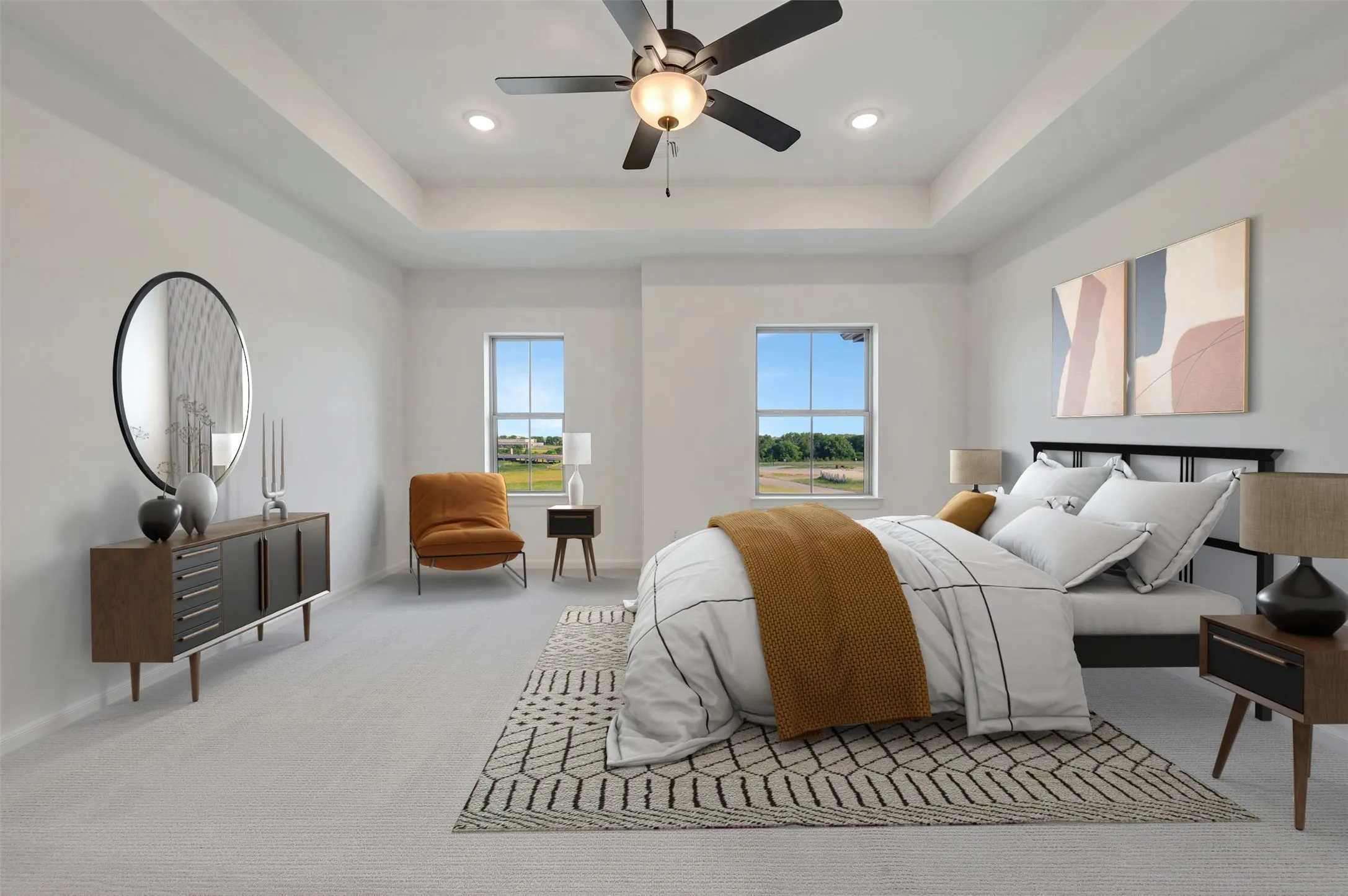 Recessed lighting illuminates a tray ceiling with a central ceiling fan