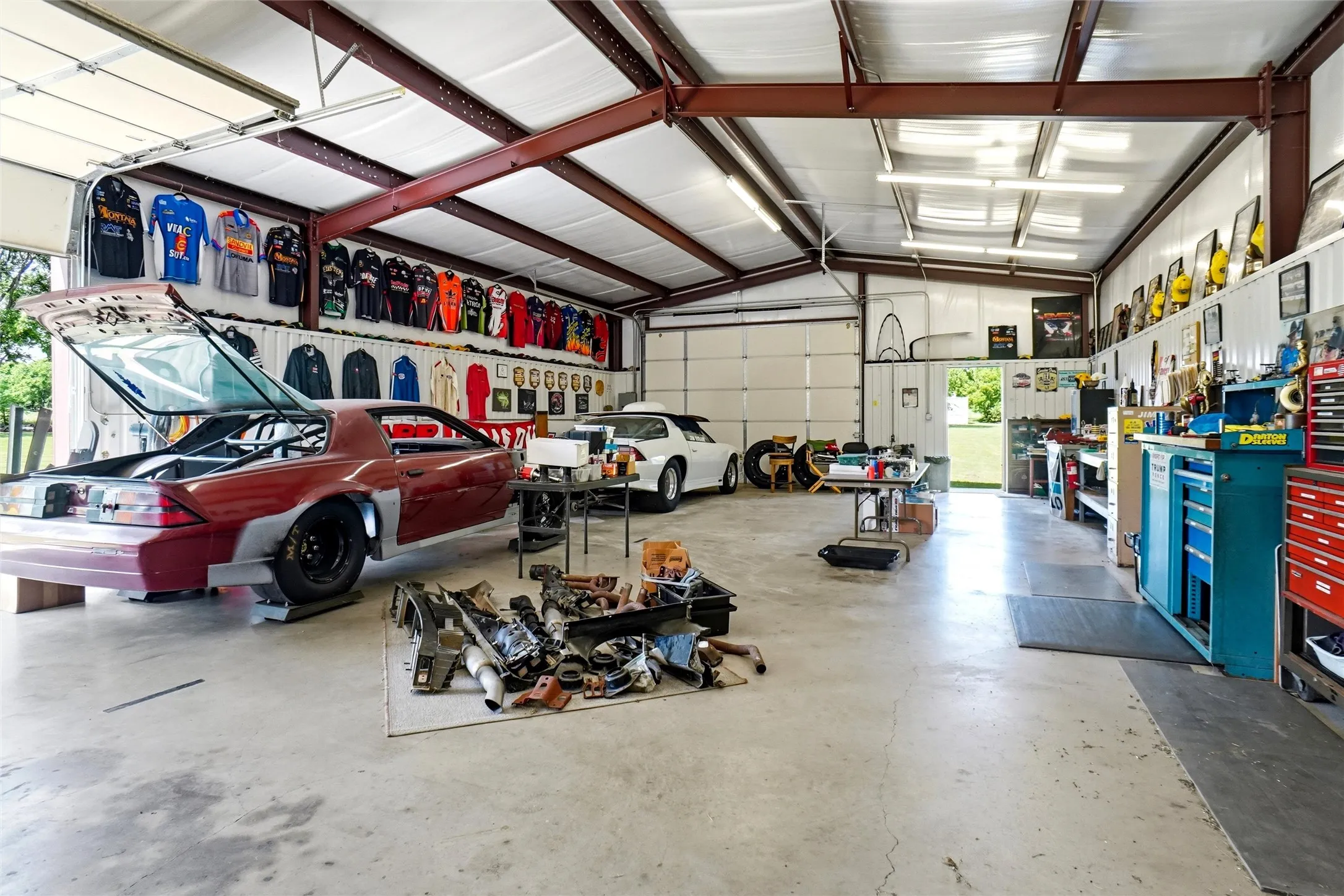 Shop has a cement floor, with electric and two roll up doors.  Shop is 30'x50'x12'- Every guys dream "Man Cave".