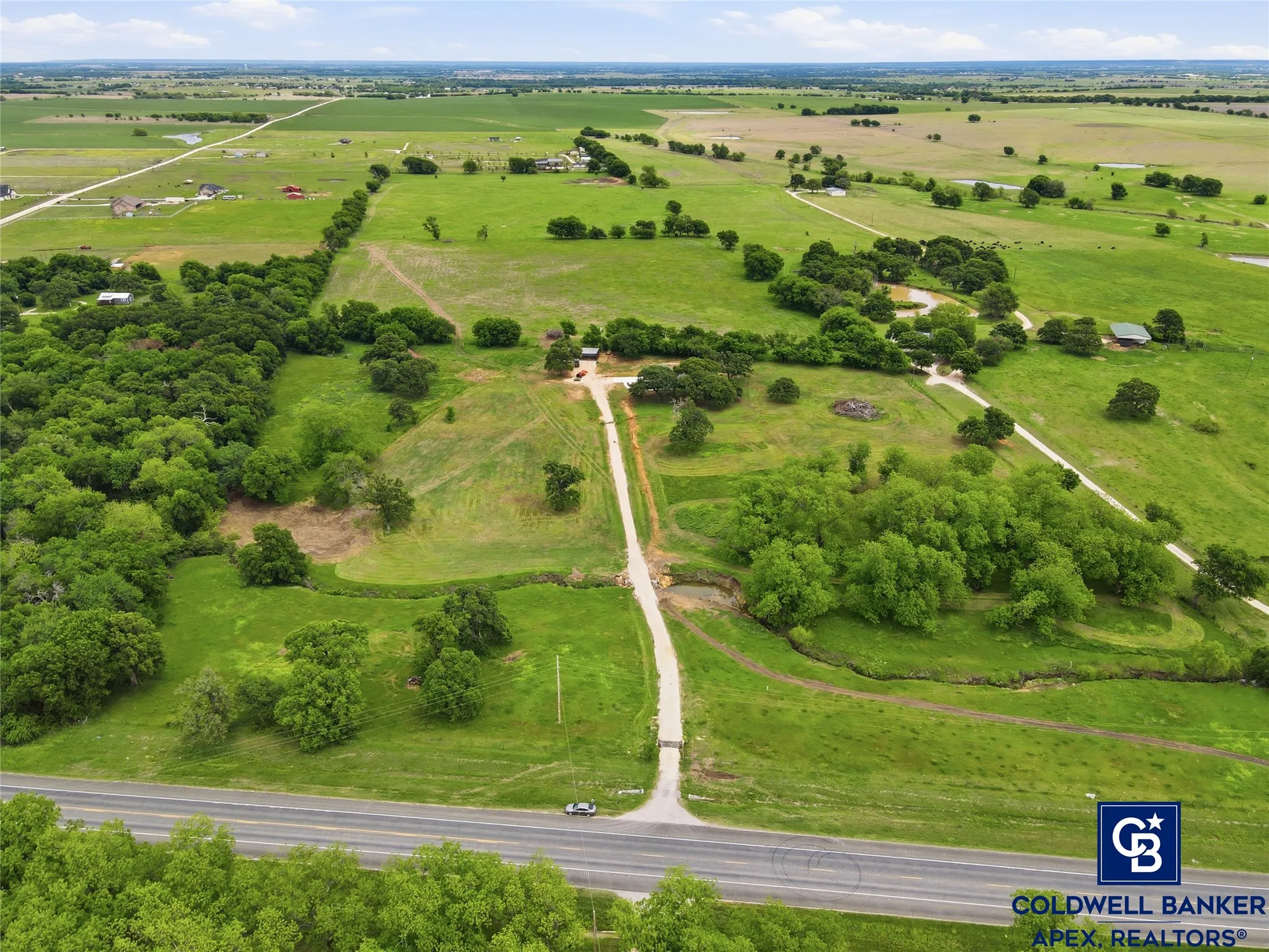 Whether you dream of raising animals, gardening, hunting, or simply escaping to your own private sanctuary, this land delivers it all. Rolling terrain, wide-open skies, and stunning panoramic views make every season feel like a postcard. The property is gently elevated, giving the home its spectacular vistas while offering multiple potential building sites, pasture areas, or recreational spots. It’s truly a rare opportunity to own a turn-key home with this much usable, beautiful acreage so close to city amenities yet feeling worlds away.