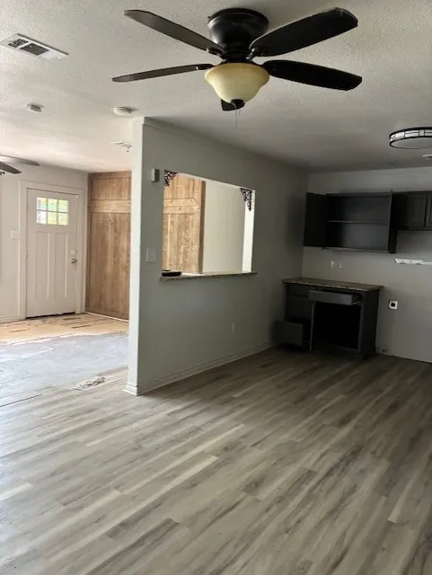 Kitchen looking into living room