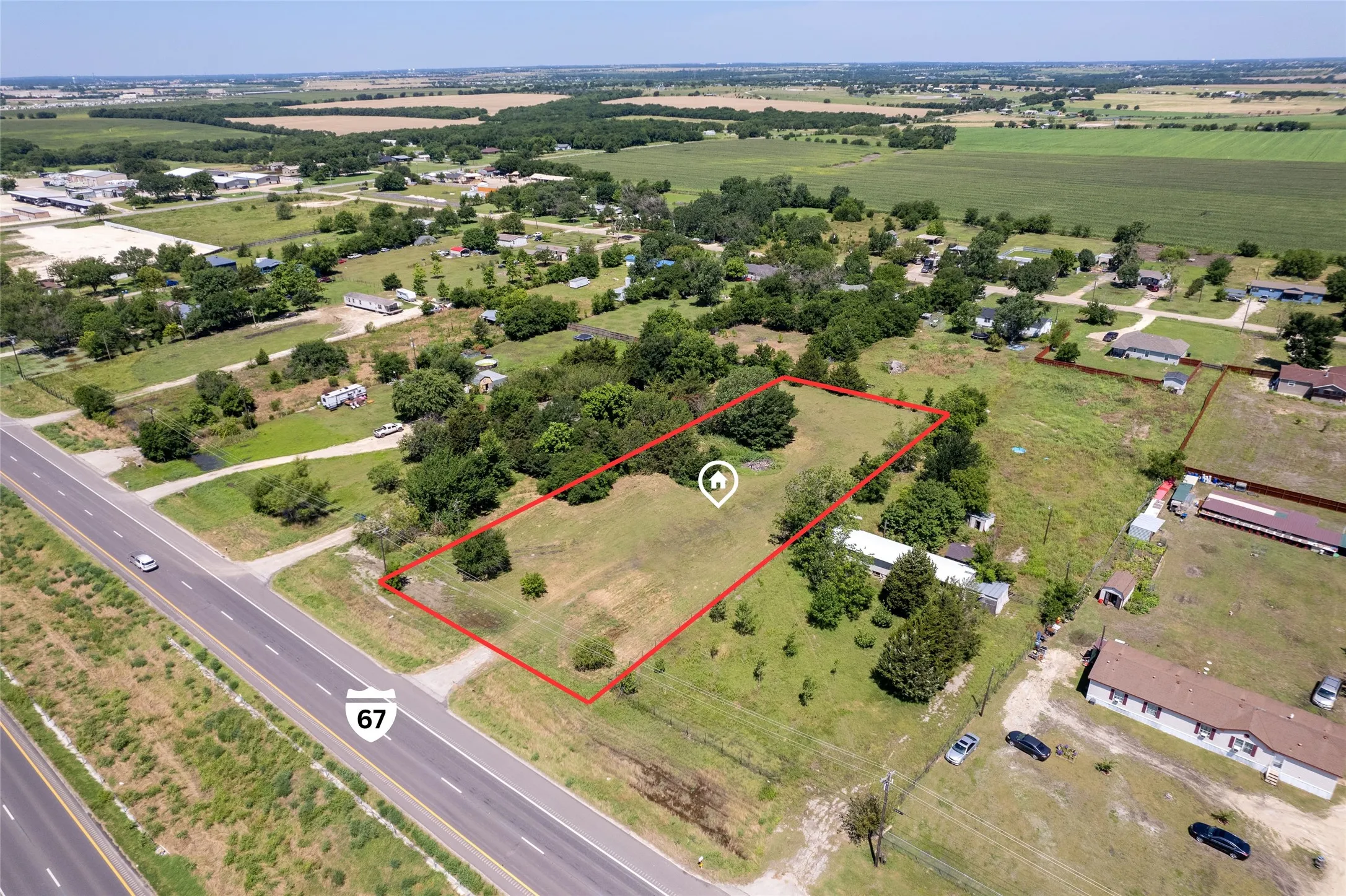 Expansive land parcel featuring direct highway frontage
