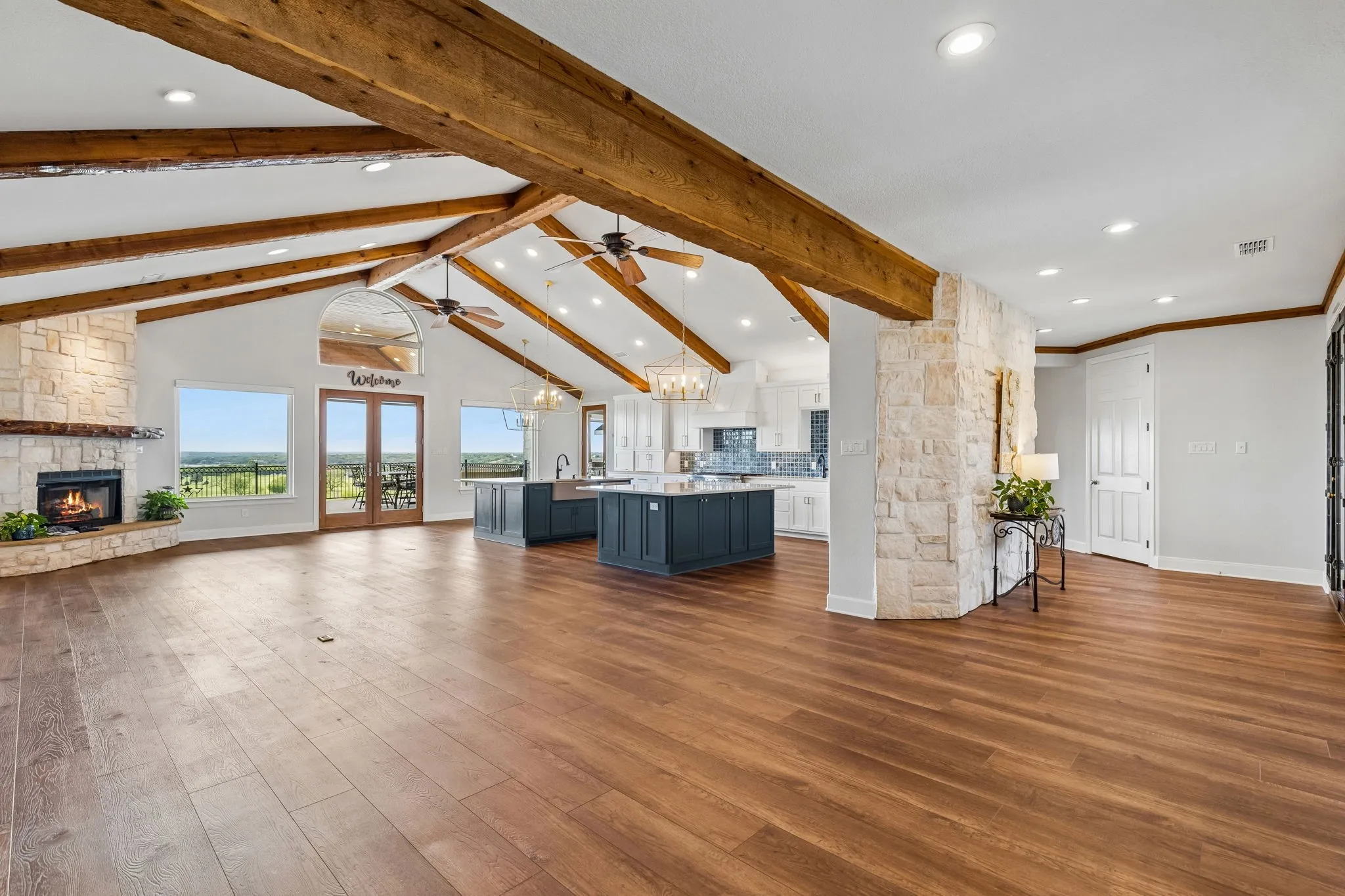 Great view of he entry foyer from the dining  roomarea also showing kitchen and living space