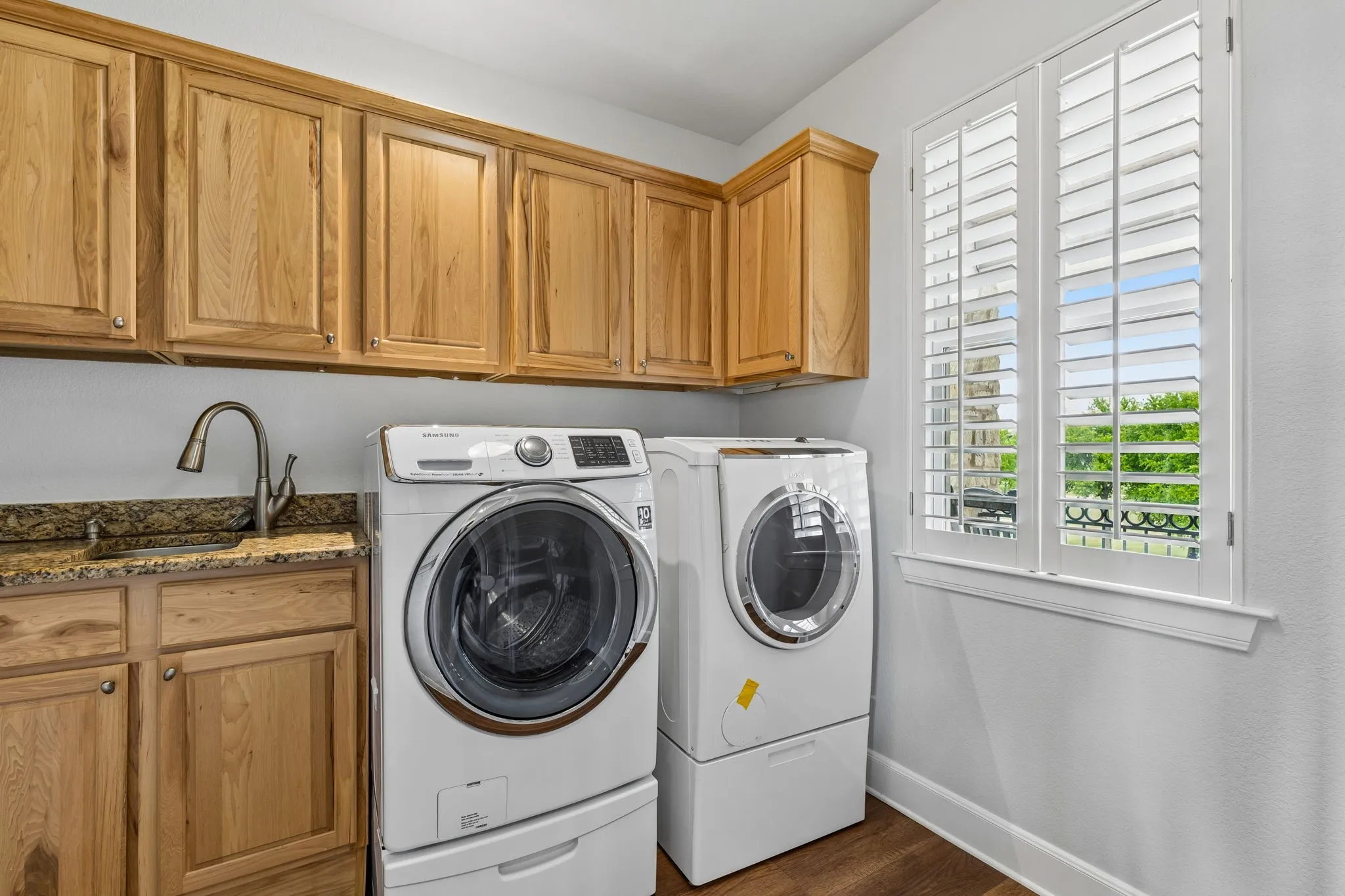 Nice size laundry area located close on main living floor. Tons of cabinets