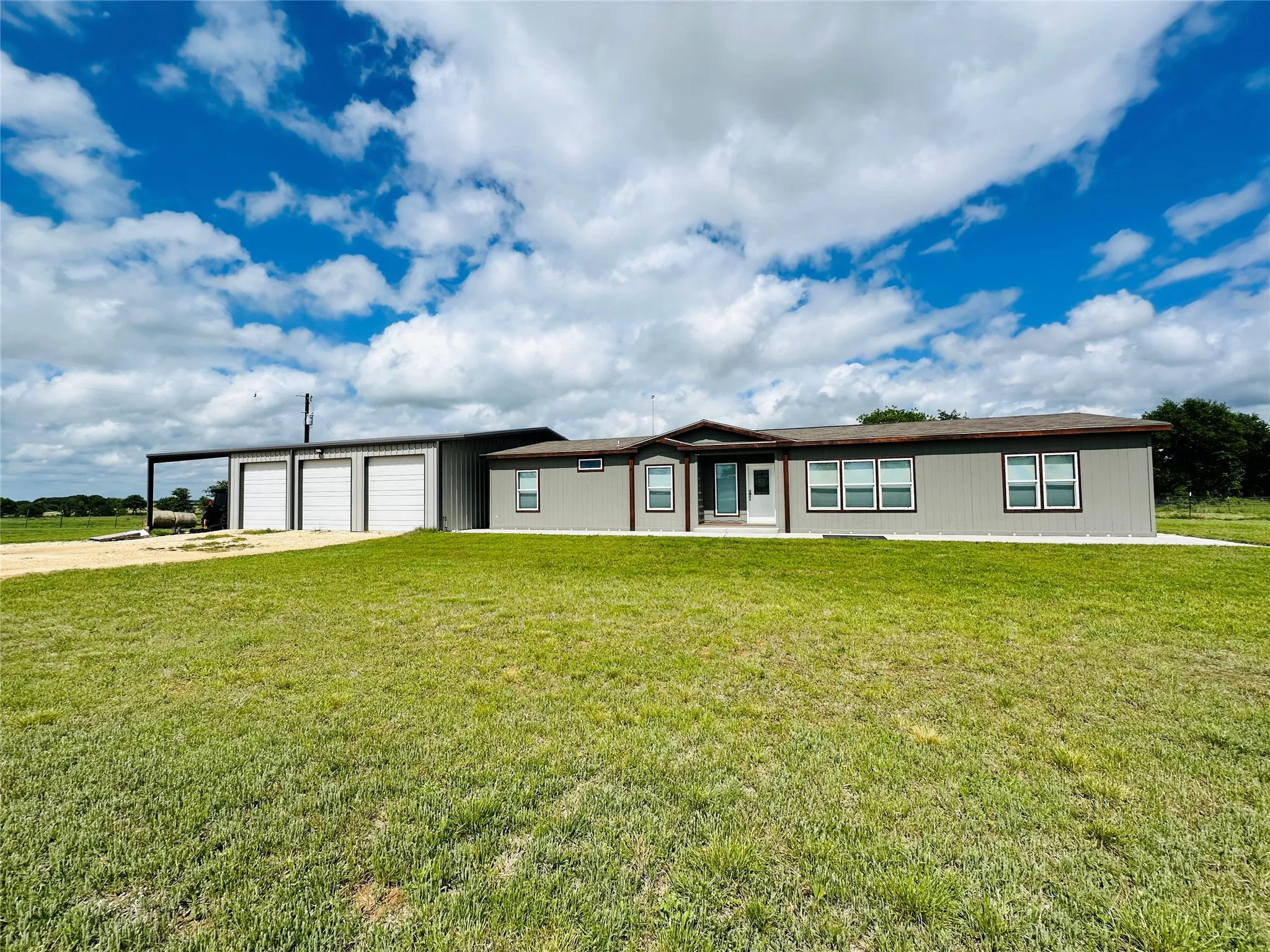 Mobile Home For Sale in Eastland County , 251 County Road 225, Rising Star, Texas 76471, 3 Bedroom, 2 Bathroom, 3 Garage spaces, 2,040 Sqft, built in 2021, Preowned, mls#21247192, Real Estate Agent in Rising Star, Homes For Sale in Eastland county, Homes For Sale in Rising Star, Realtor in Rising Star Texas, Real Estate Brokerage Independent Realty Texas, Luminita Cordes Realtor