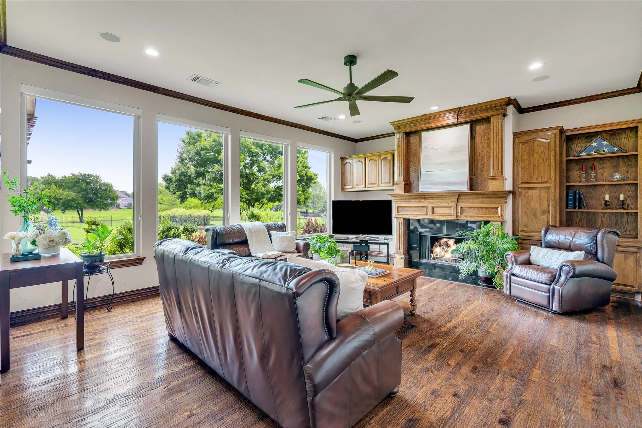 Elegant millwork and a cozy fireplace in the Living Room.