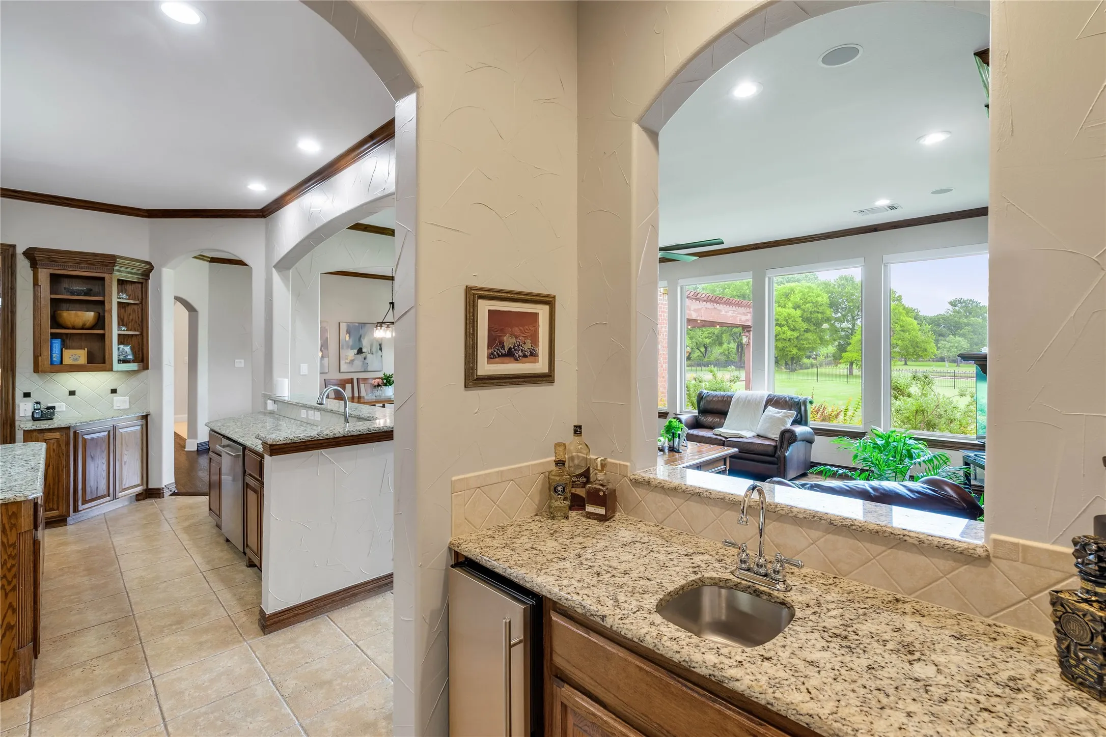 Wet bar adjacent to the kitchen and Living Room.