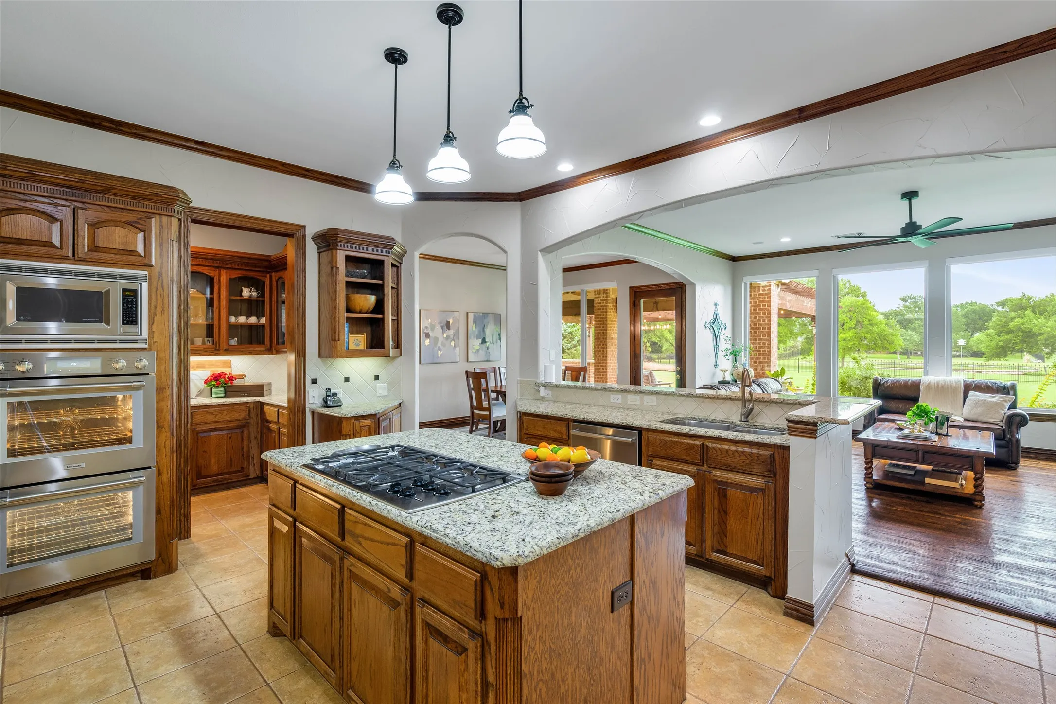 Outstanding storage, gas cooktop, professional series double ovens (Thermador), and a built in refrigerator.