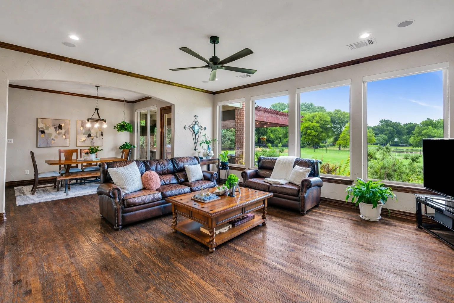 The large Living Room with huge picture windows can hold a crowd!