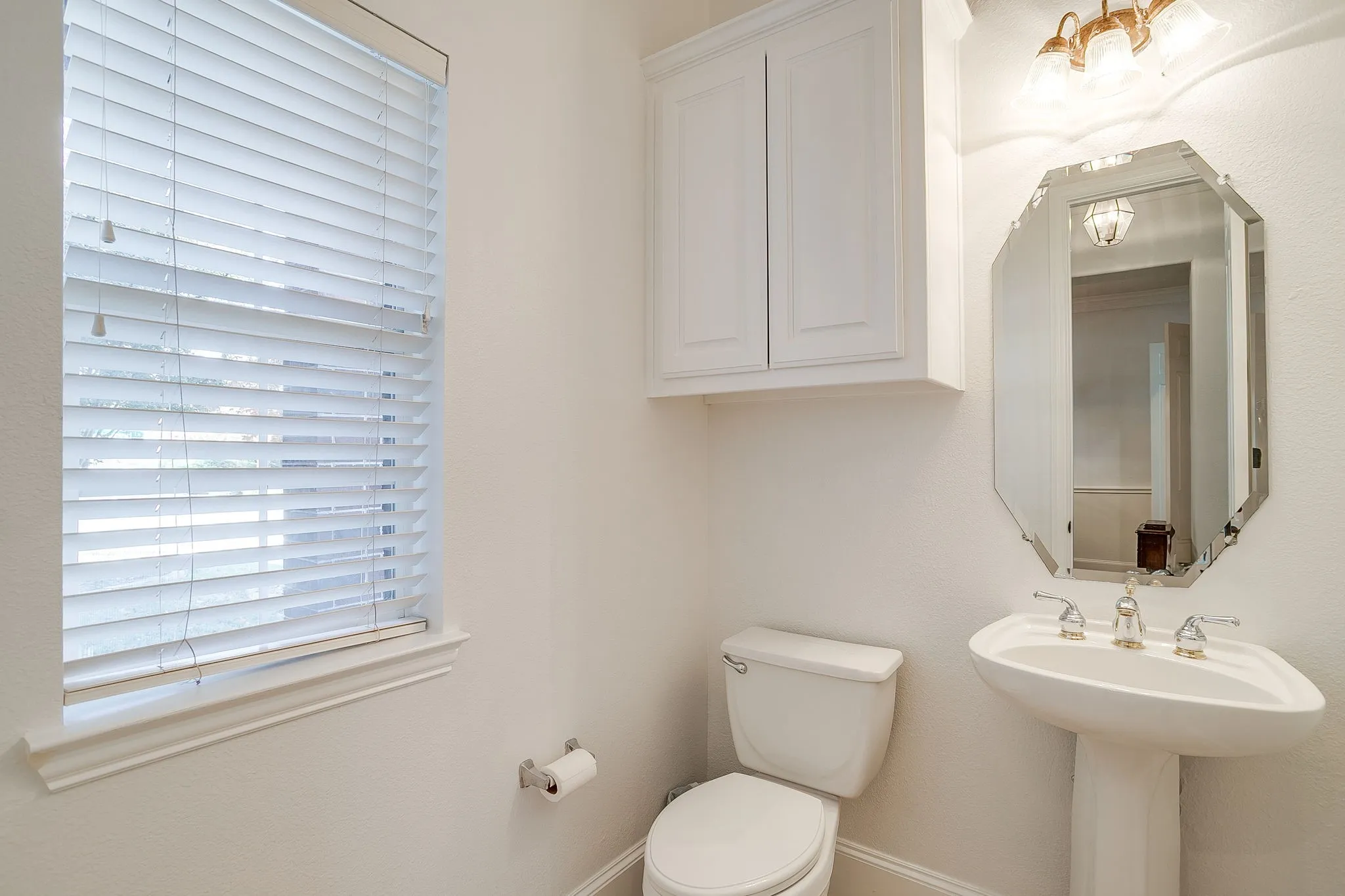 Bathroom featuring toilet and baseboards