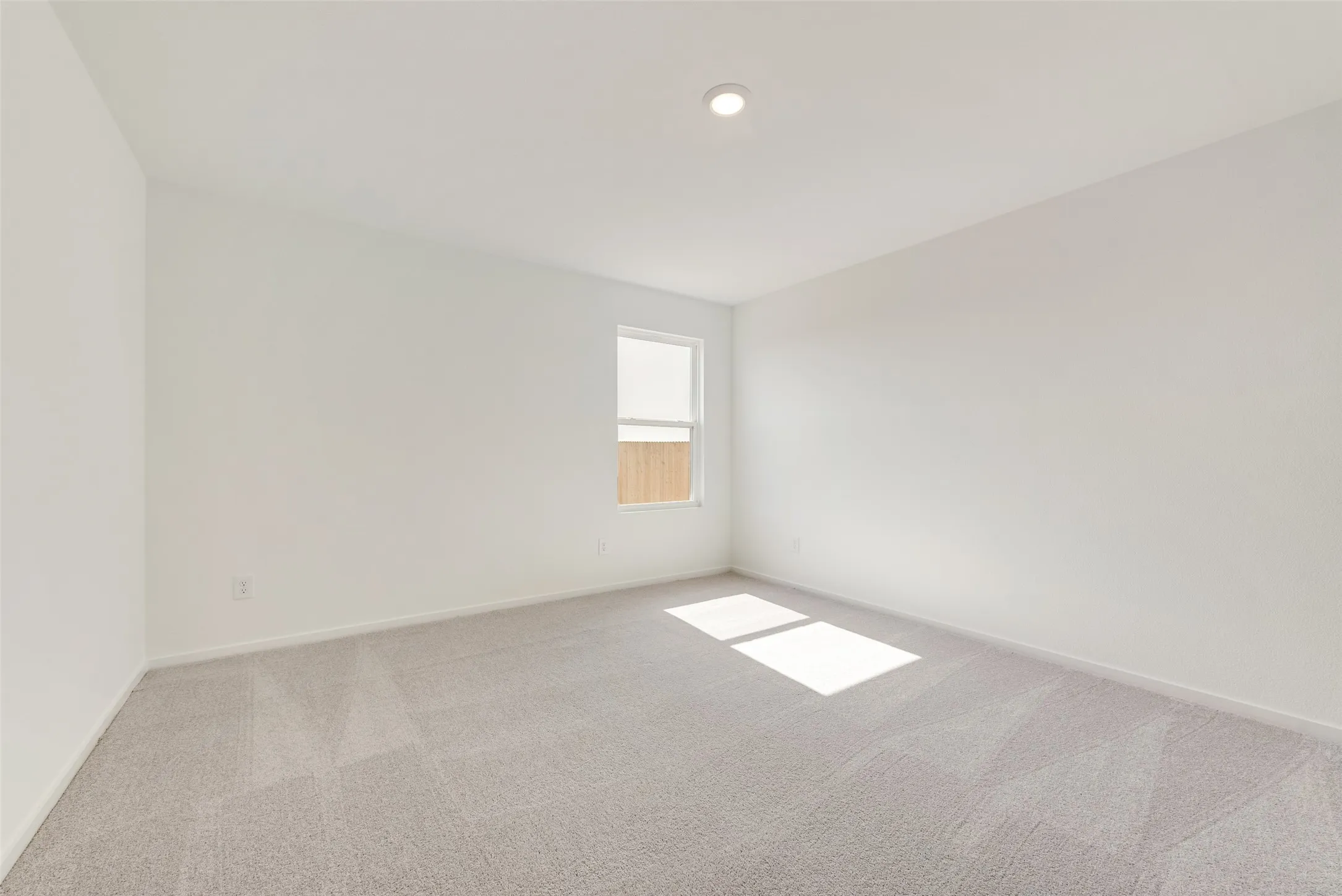 Unfurnished room with carpet and recessed lighting