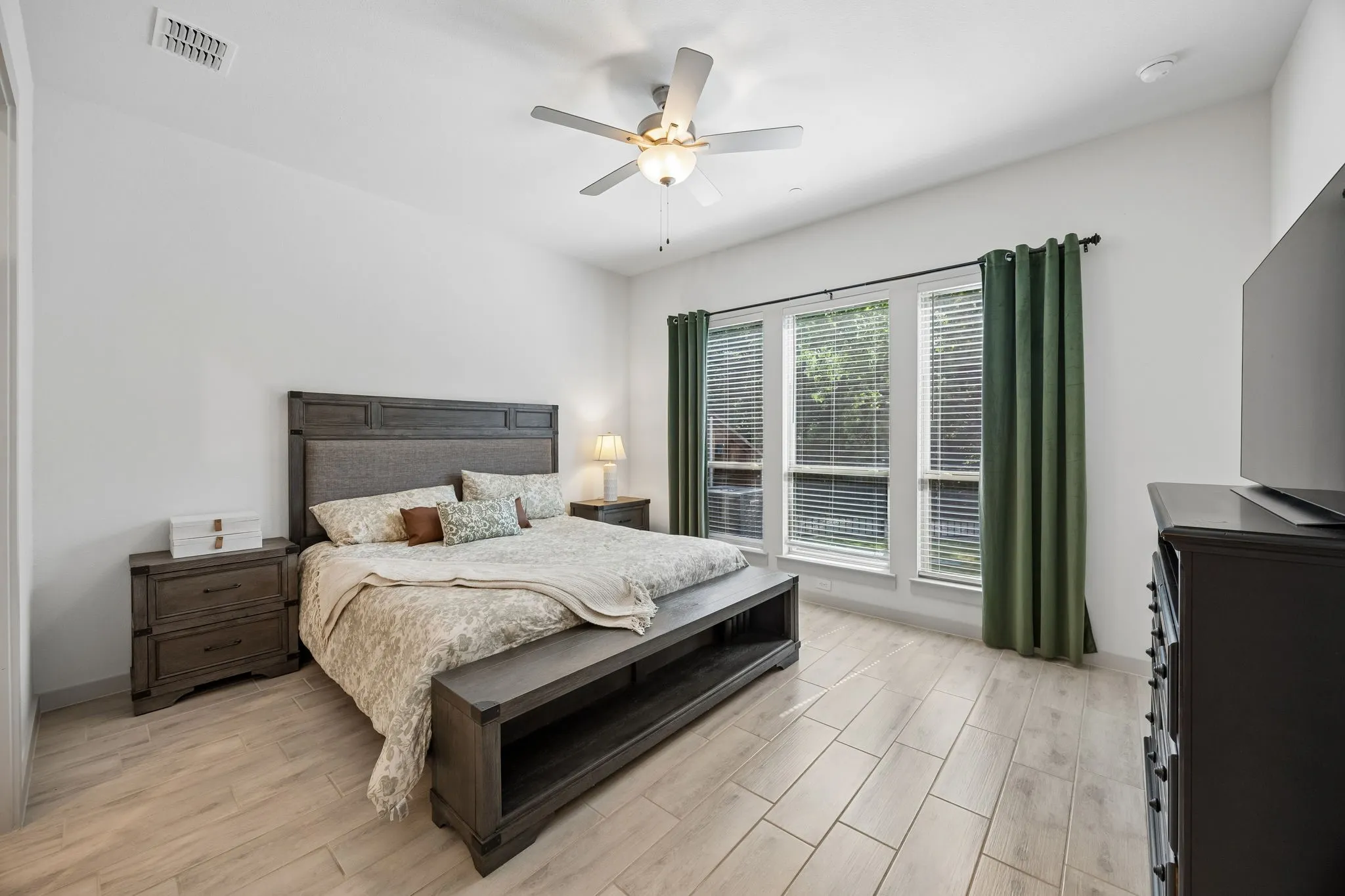 The primary suite is your personal retreat, featuring a spacious bedroom and ensuite bath.