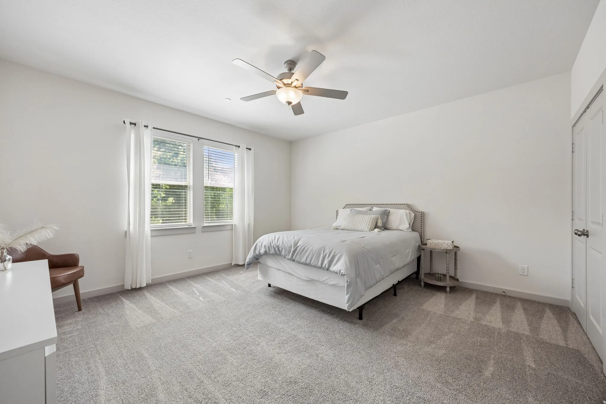 2nd of 2 generous bedrooms up with walk in closet.