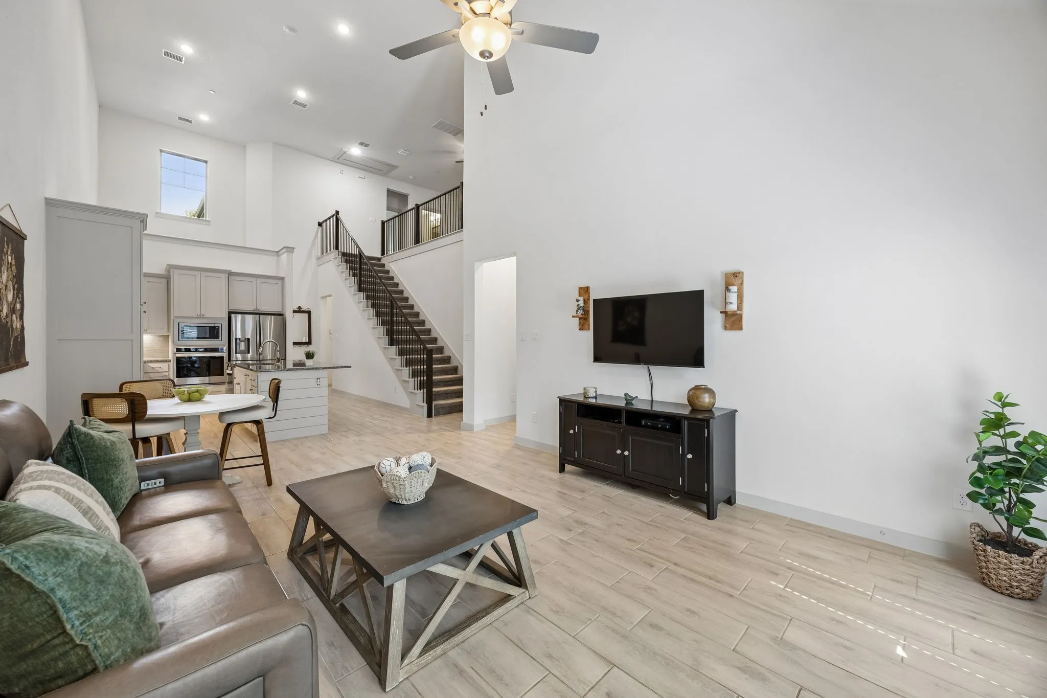 Whether you're preparing a casual breakfast or hosting a dinner party, this living space is designed to keep everyone connected.