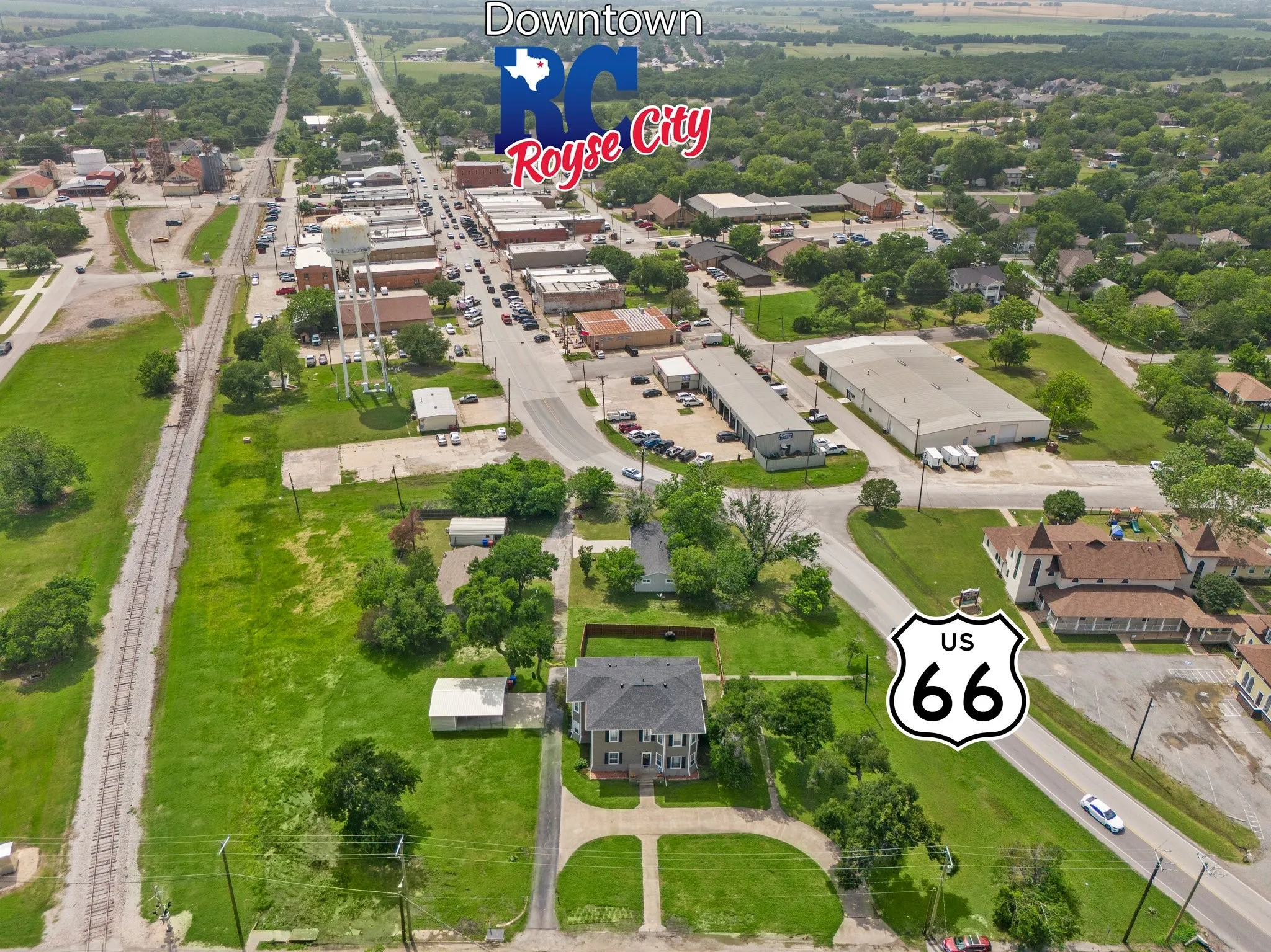 Aerial view featuring extensive green spaces and established surrounding infrastructure